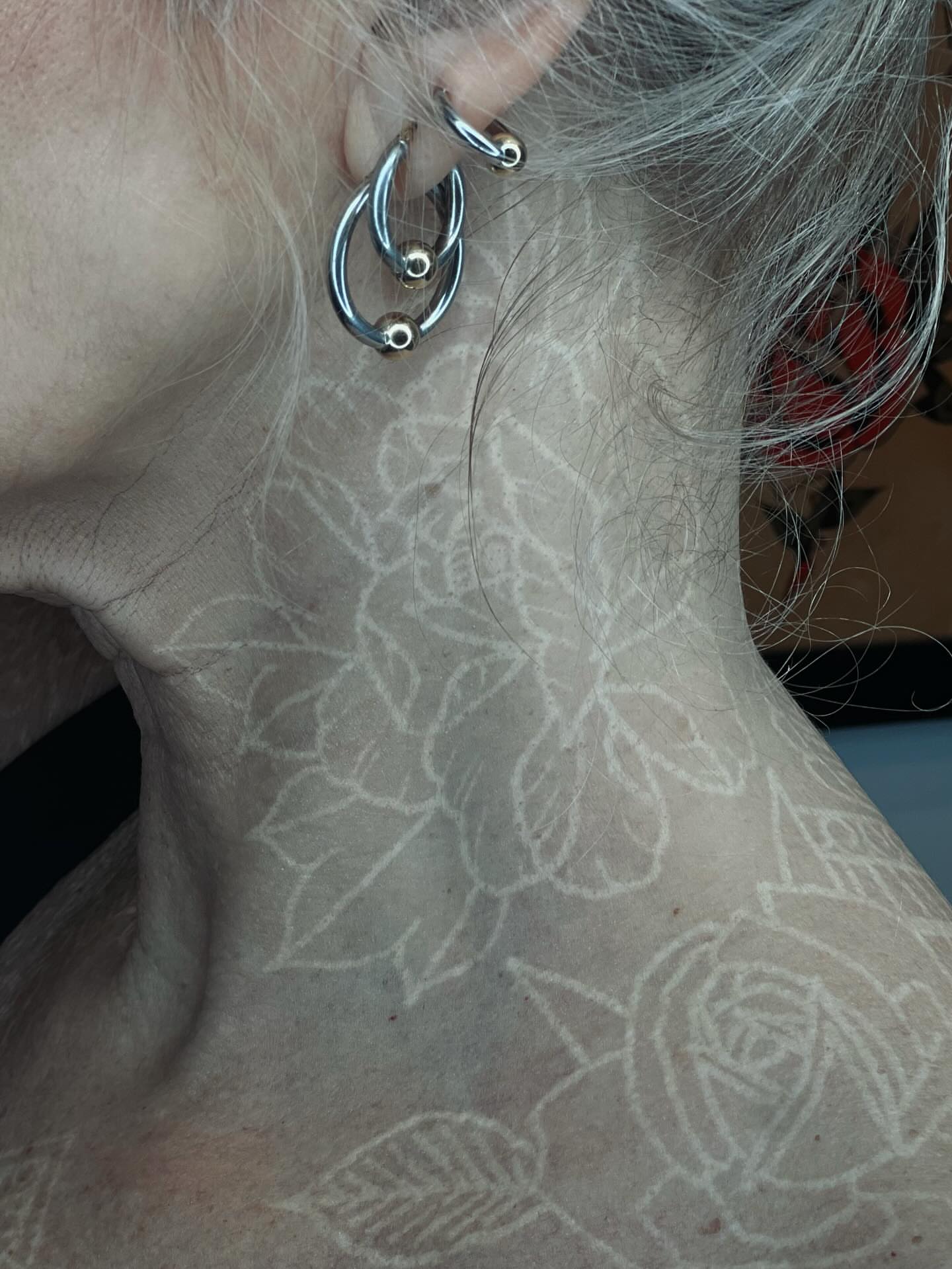 Floral black and grey tattoo on the neck by Blake Francis, Worcester, Massachusetts