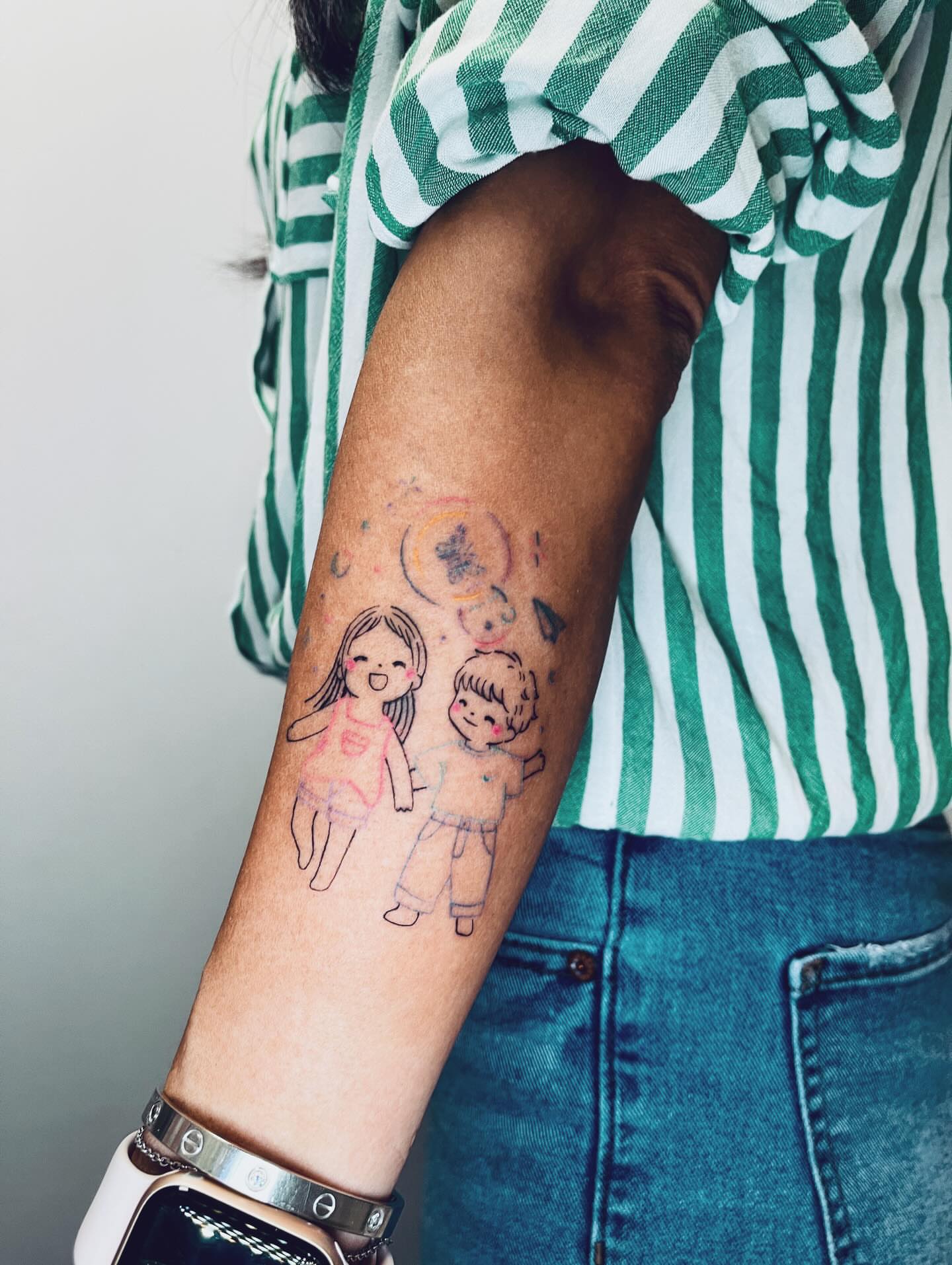 Children illustrative tattoo on the forearm by vivian