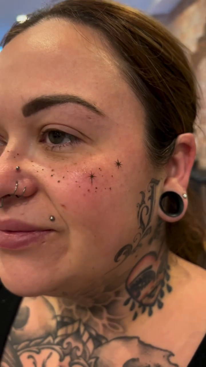 Freckle-like dots fine line tattoo by High Vibrations
