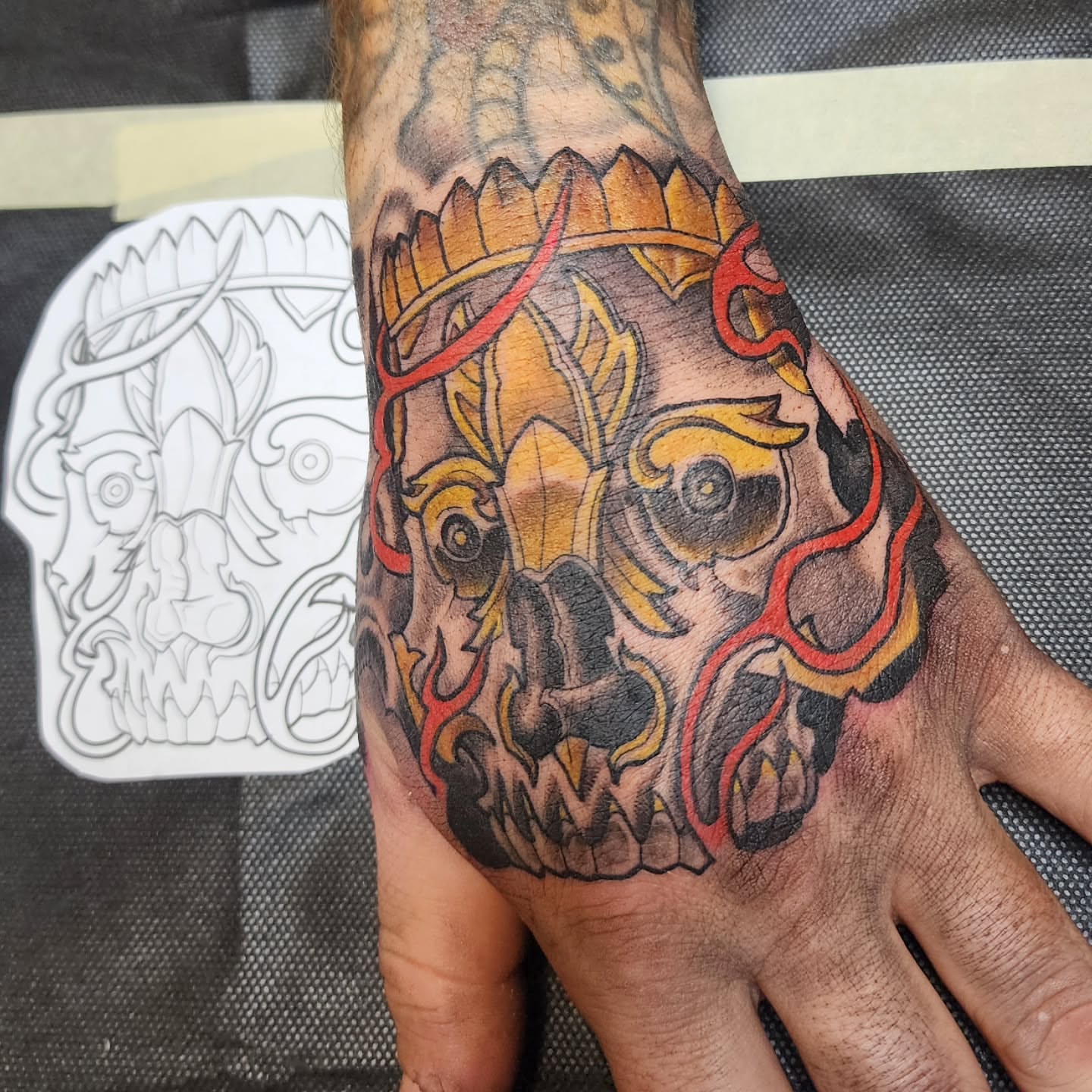 Skull American traditional tattoo on the hand by Anthony Moncada