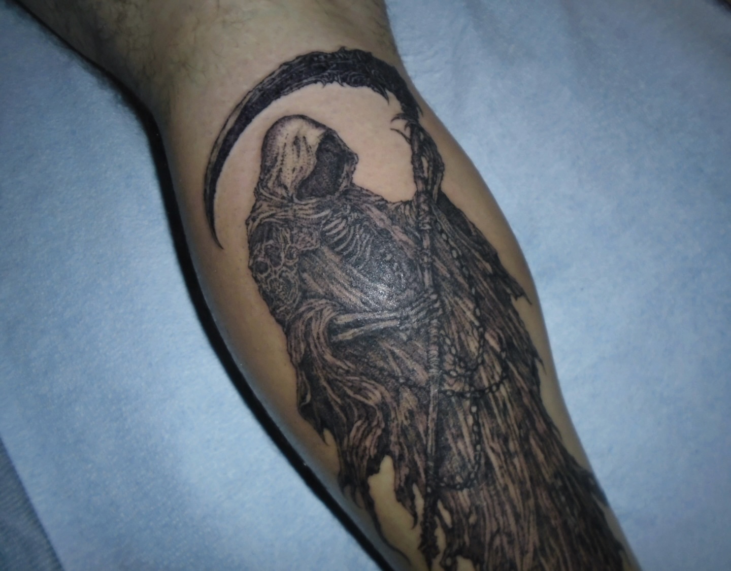 Grim reaper black and grey tattoo on the forearm by Penelope