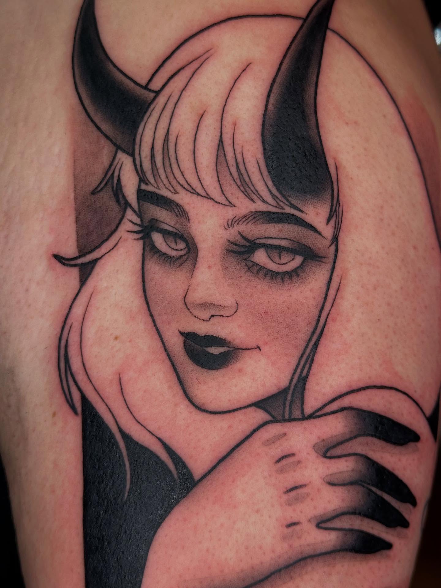 Female face with horns black and grey tattoo on the upper arm by ✨ Mandy Foster - Bremerton Tattoo Artist✨, Bremerton, Washington