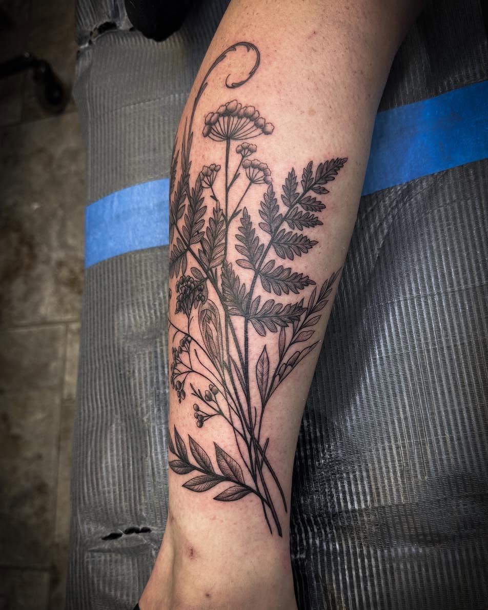 Herbaceous plant black and grey tattoo on the forearm by 𝔻𝕖𝕣𝕣𝕚𝕔𝕜 𝔹𝕦𝕪𝕖𝕒, East Aurora, New York