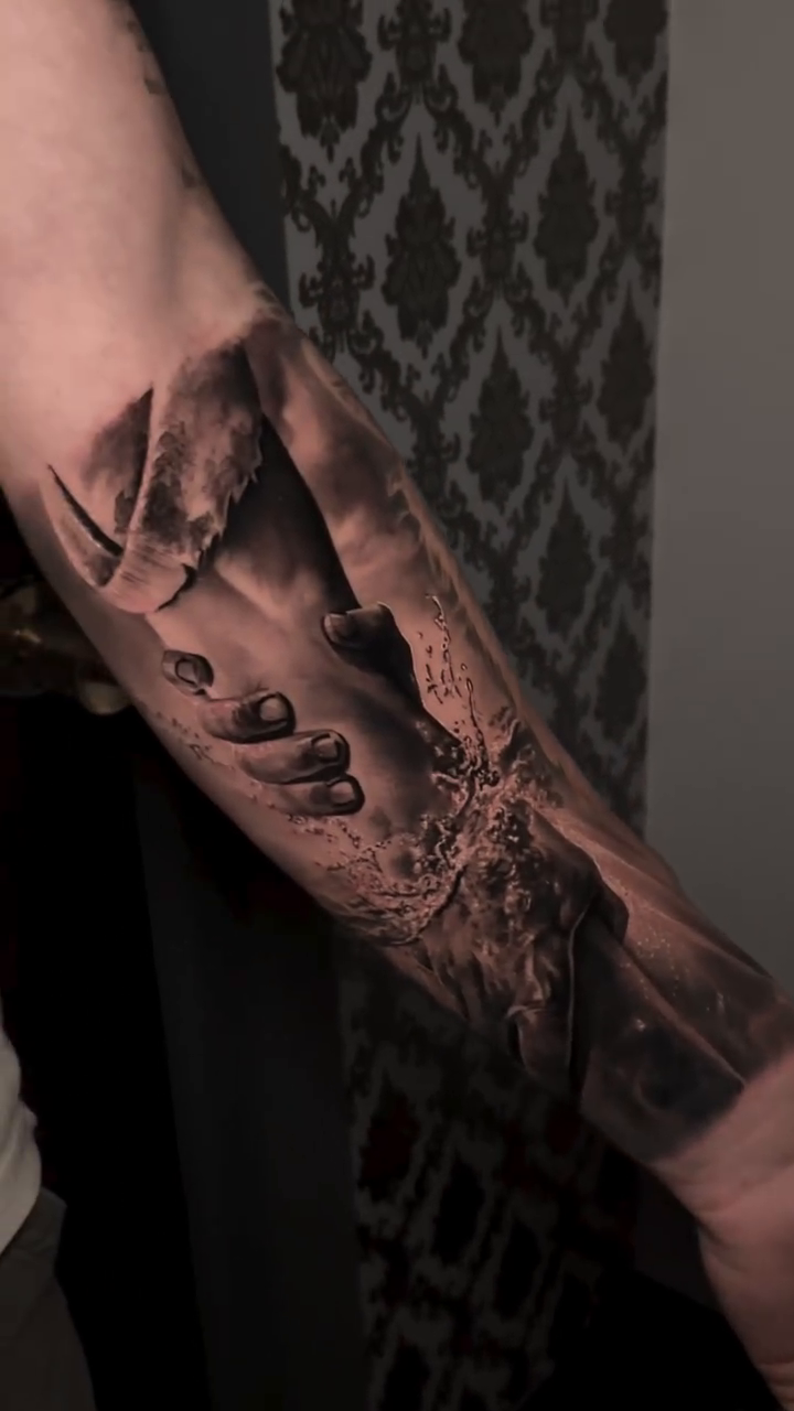 Tattoo by @tattoo_ravay — realism, black_and_grey