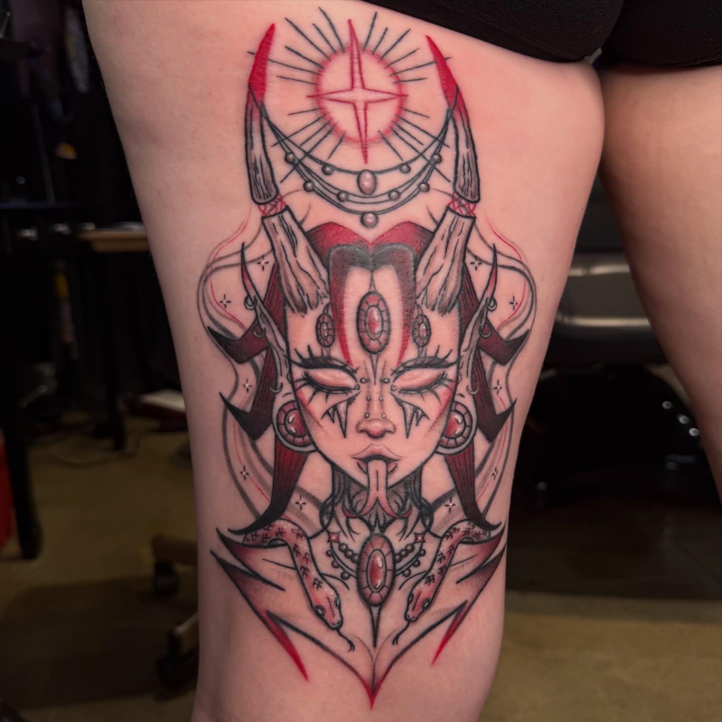 Demon-like creature geometric tattoo on the thigh by Chloe Peters 🦭🦄🏳️‍🌈