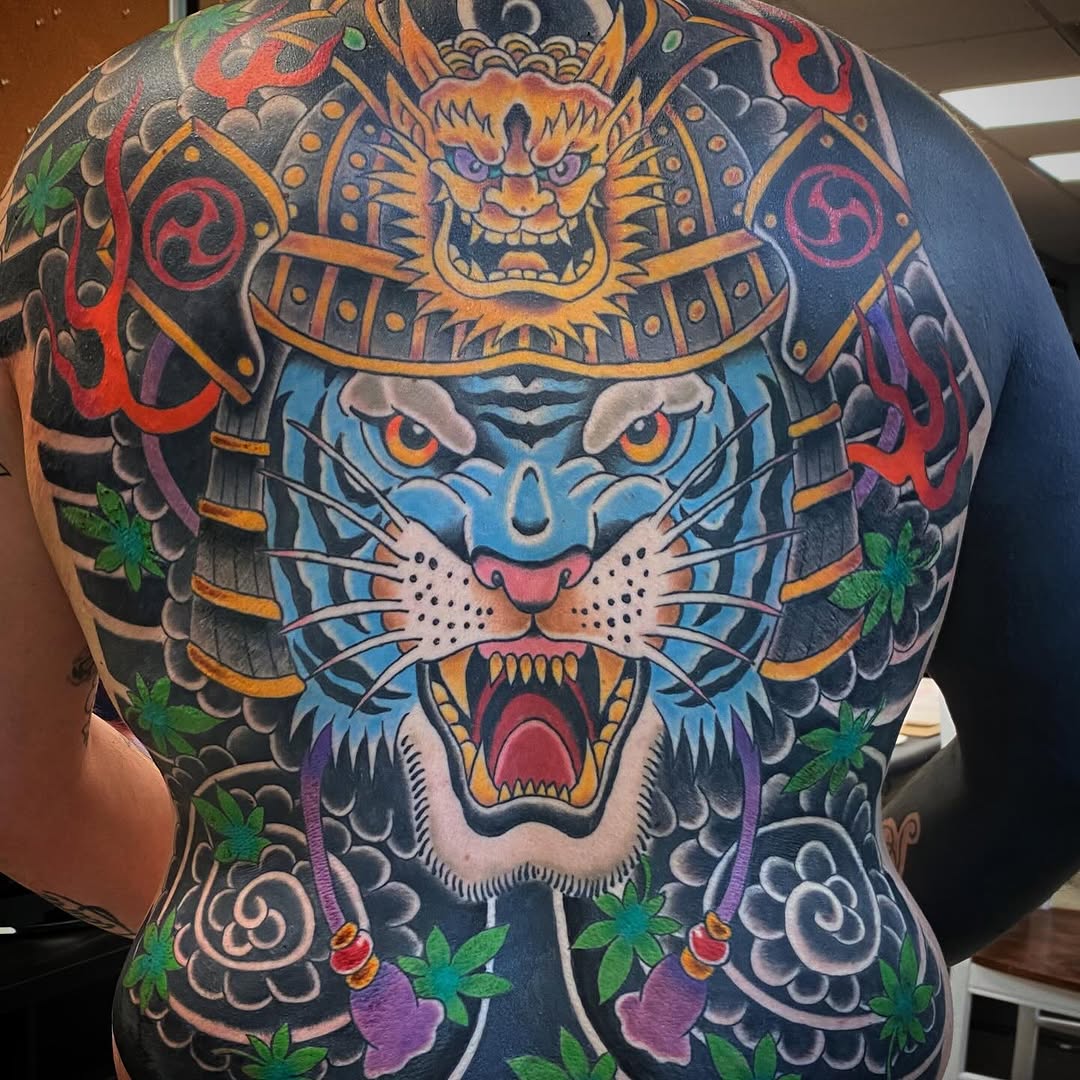 Tiger and dragon samurai helmet Japanese tattoo on the back by Kyle Mitchell, Cincinnati