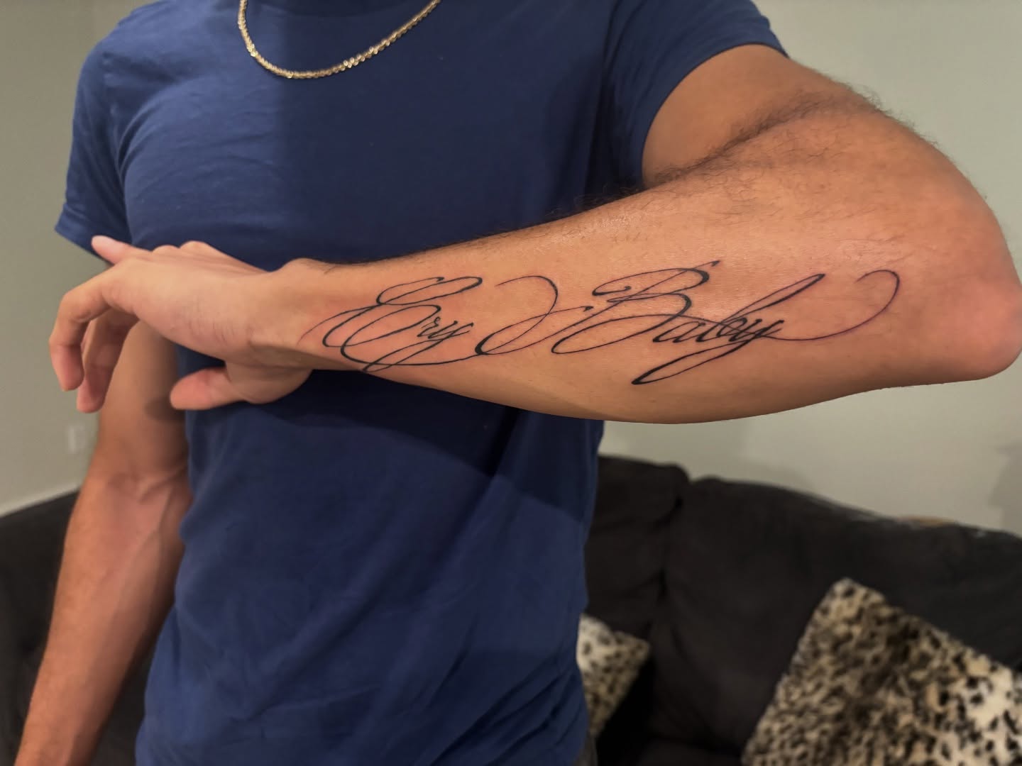 Cry Baby lettering script tattoo on the forearm by @miffythereaper