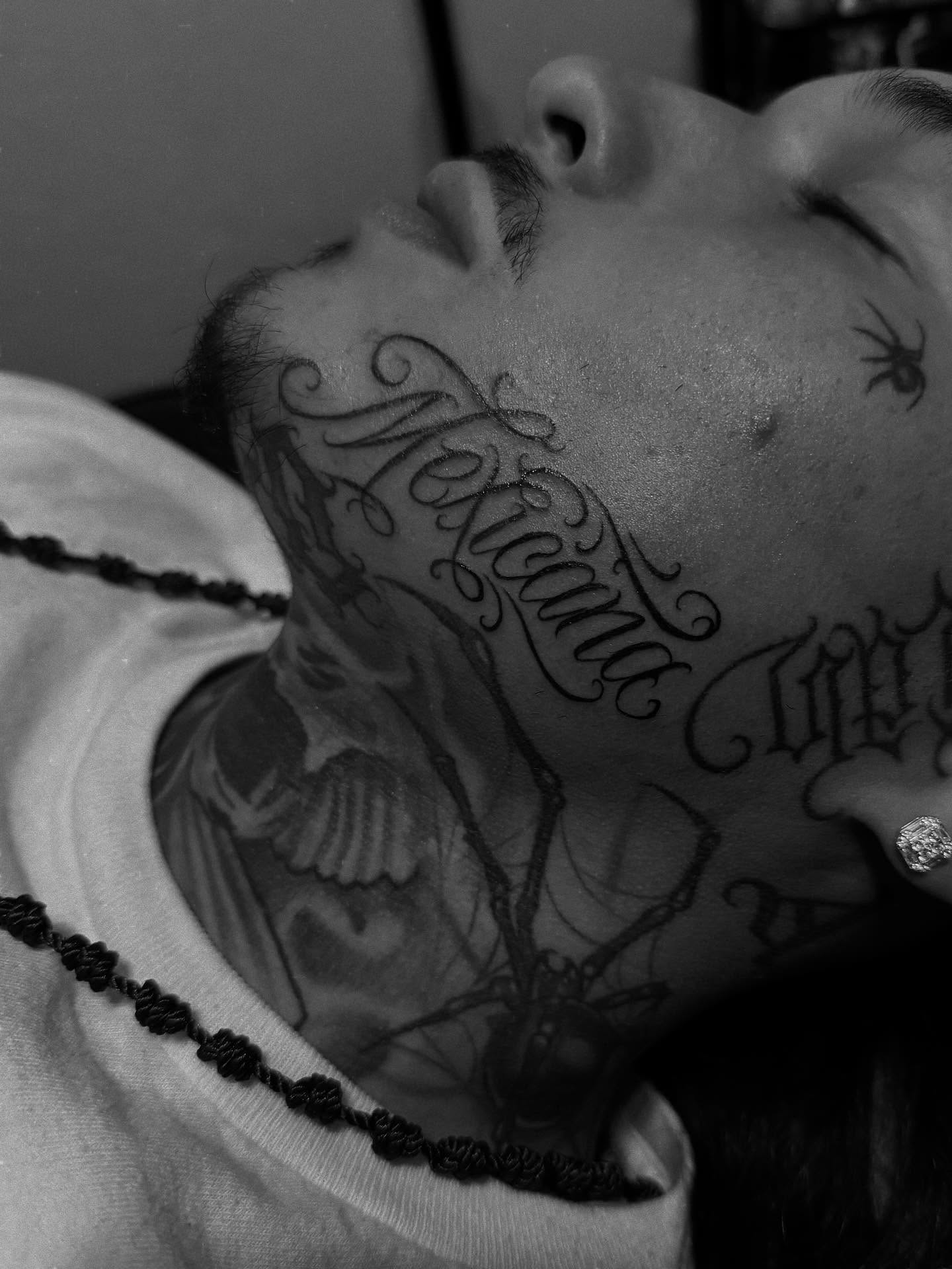 Script lettering lettering script tattoo on the neck by Smuk One