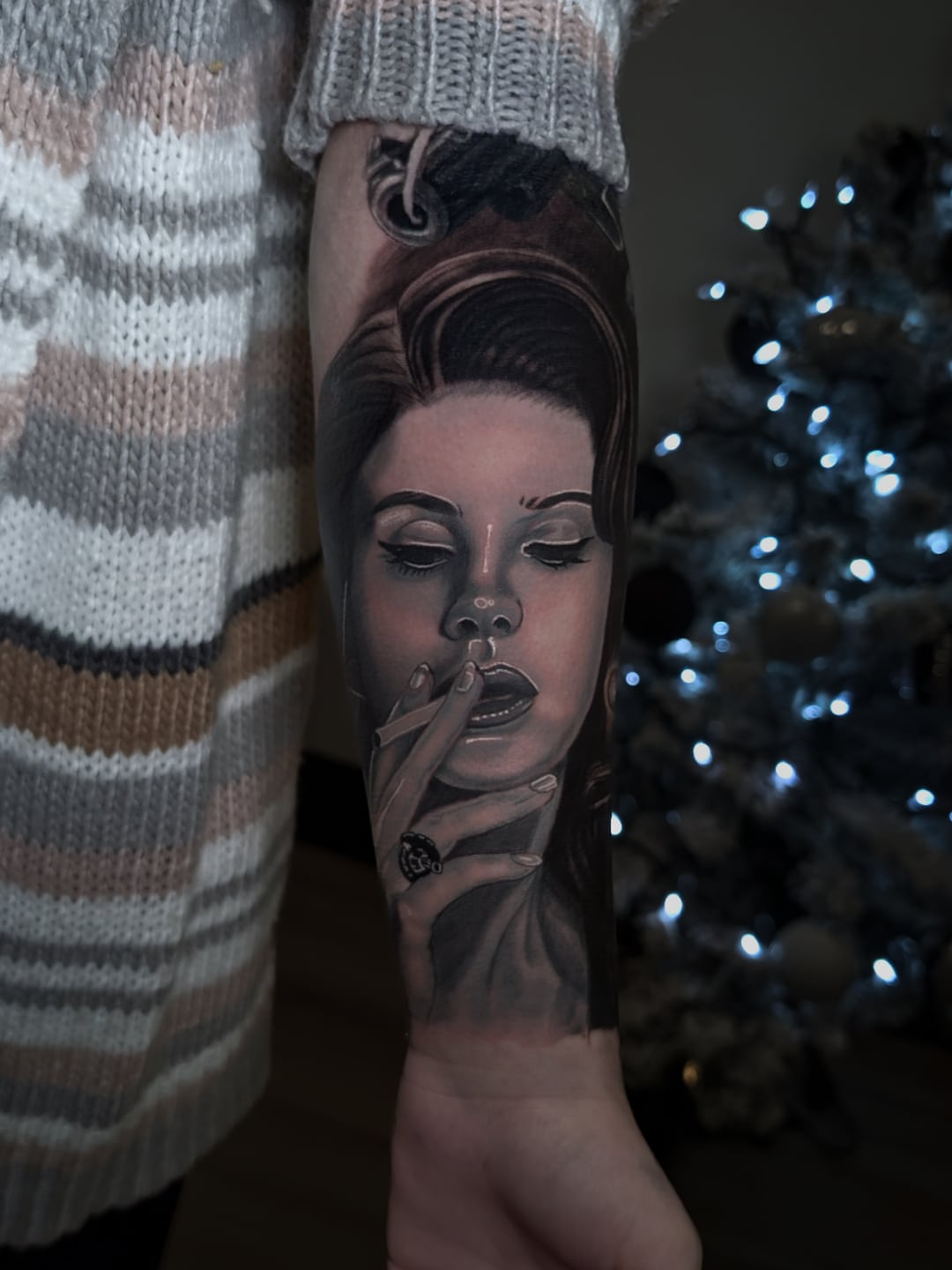 Woman smoking realism tattoo on the forearm by Antonio Arias