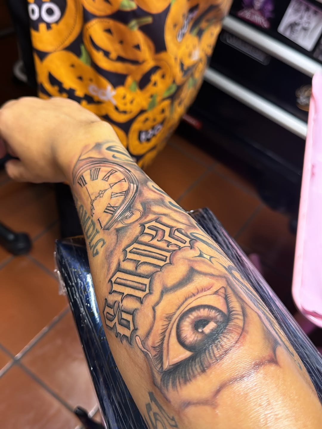 Clock and eye with script Chicano tattoo on the forearm by Mi♥️Amor♥️Ink