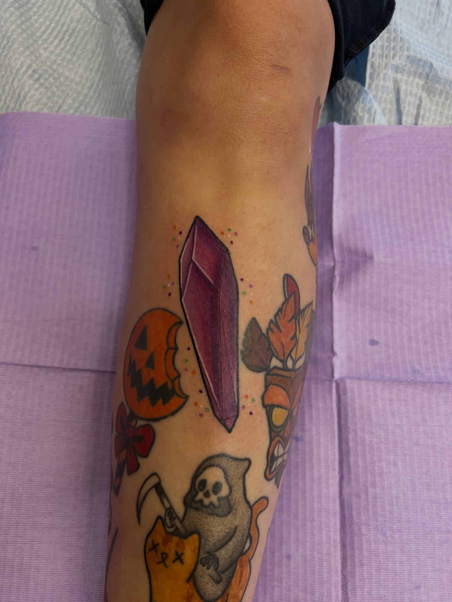 Crystal American traditional tattoo on the forearm by Leslie Paskoff