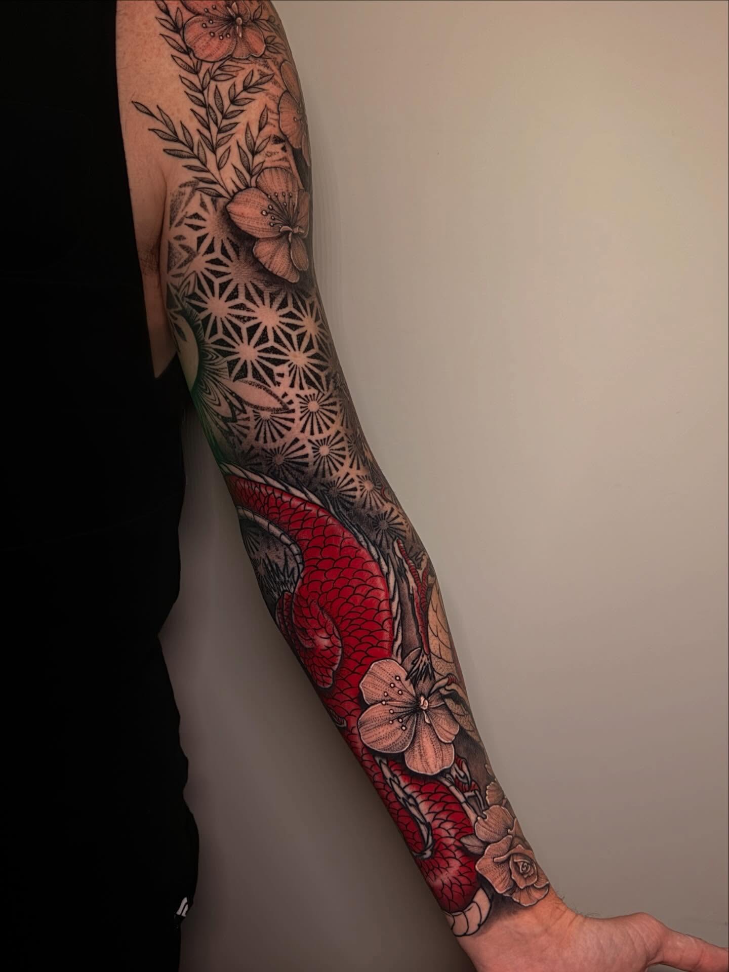Koi fish and floral japanese irezumi tattoo on the forearm by Tattoos by Robyn Pallotta, Austin, Texas