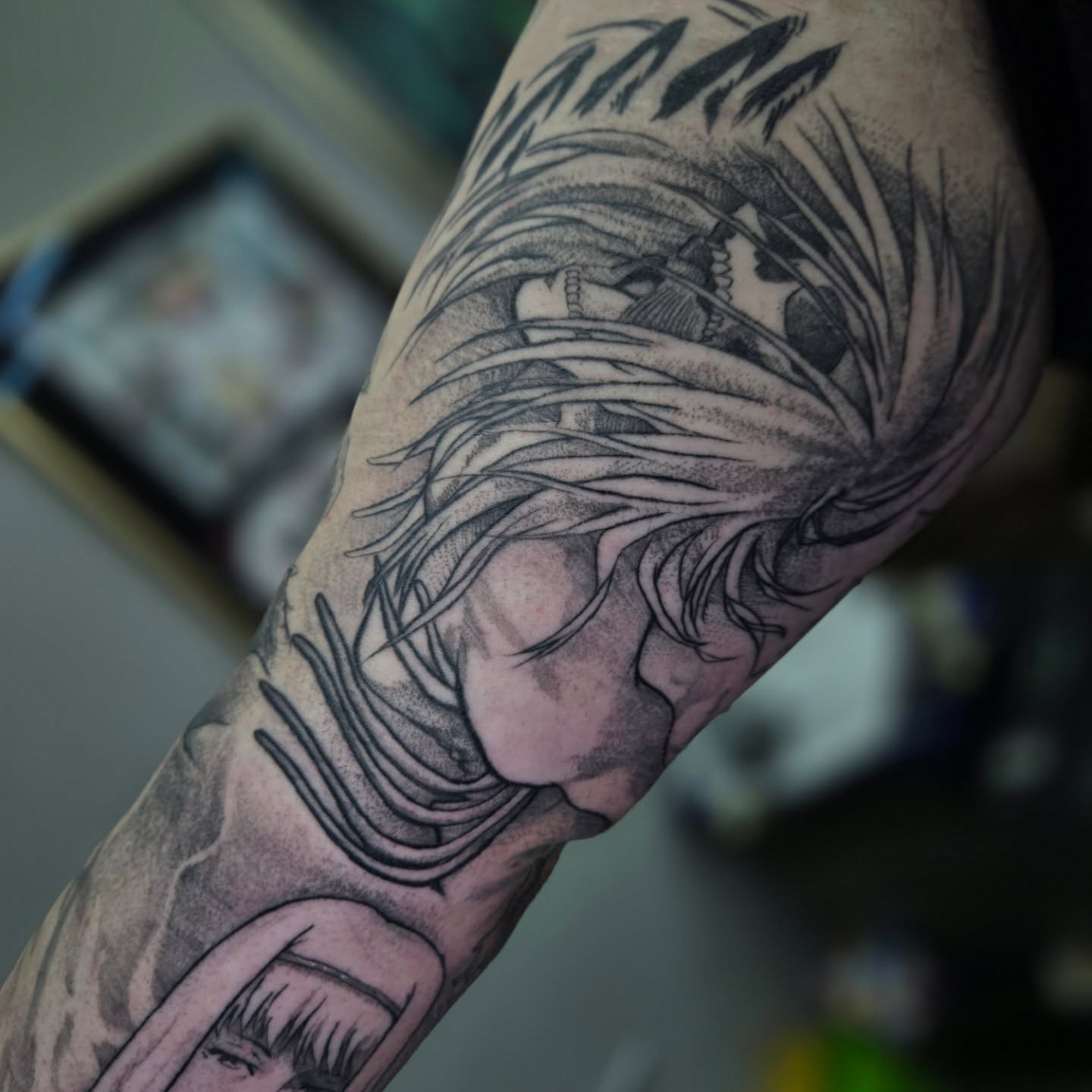 Man with long hair black and grey tattoo on the forearm by π°ππππ π»ππππ - π°ππππ π±&πΆ ππππππ π°πππππ