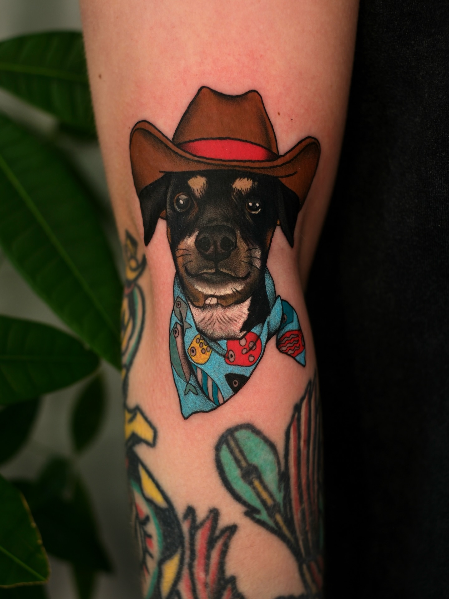 Dog wearing cowboy hat American traditional tattoo on the forearm by Mallory Murphy, Denton, Texas
