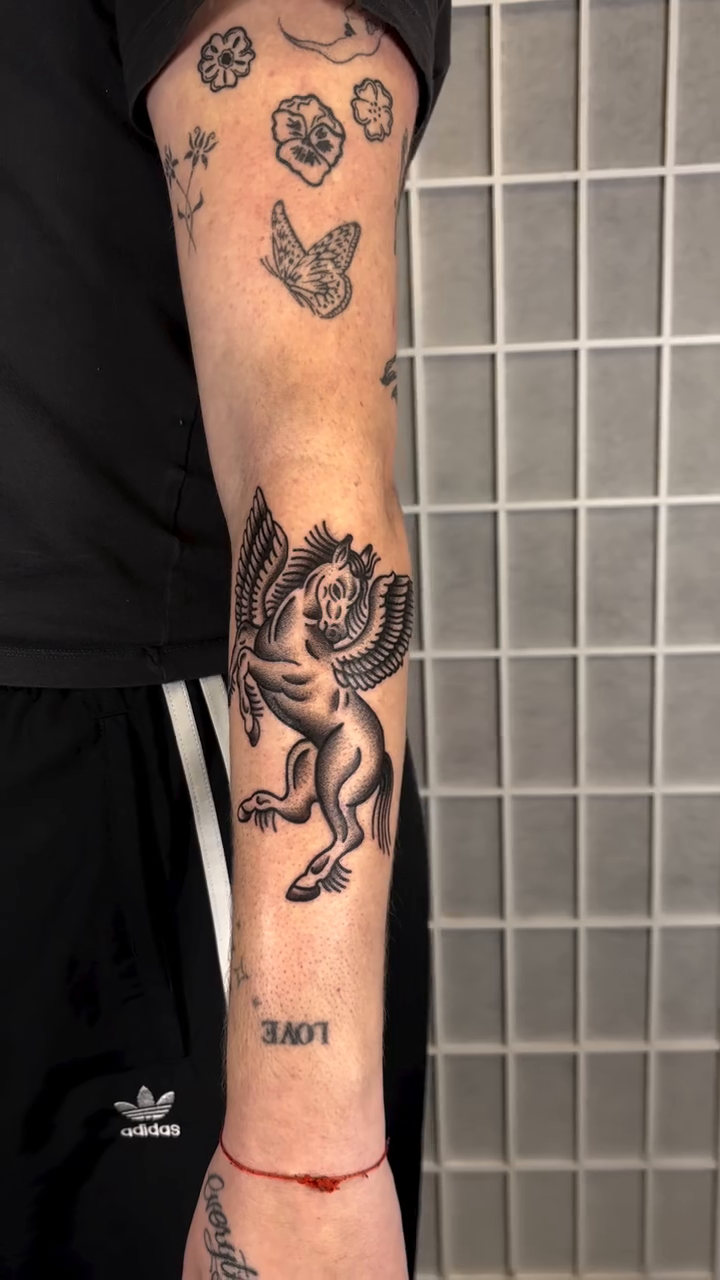 Pegasus realism tattoo by Vlad Nemirovsky Tattoo
