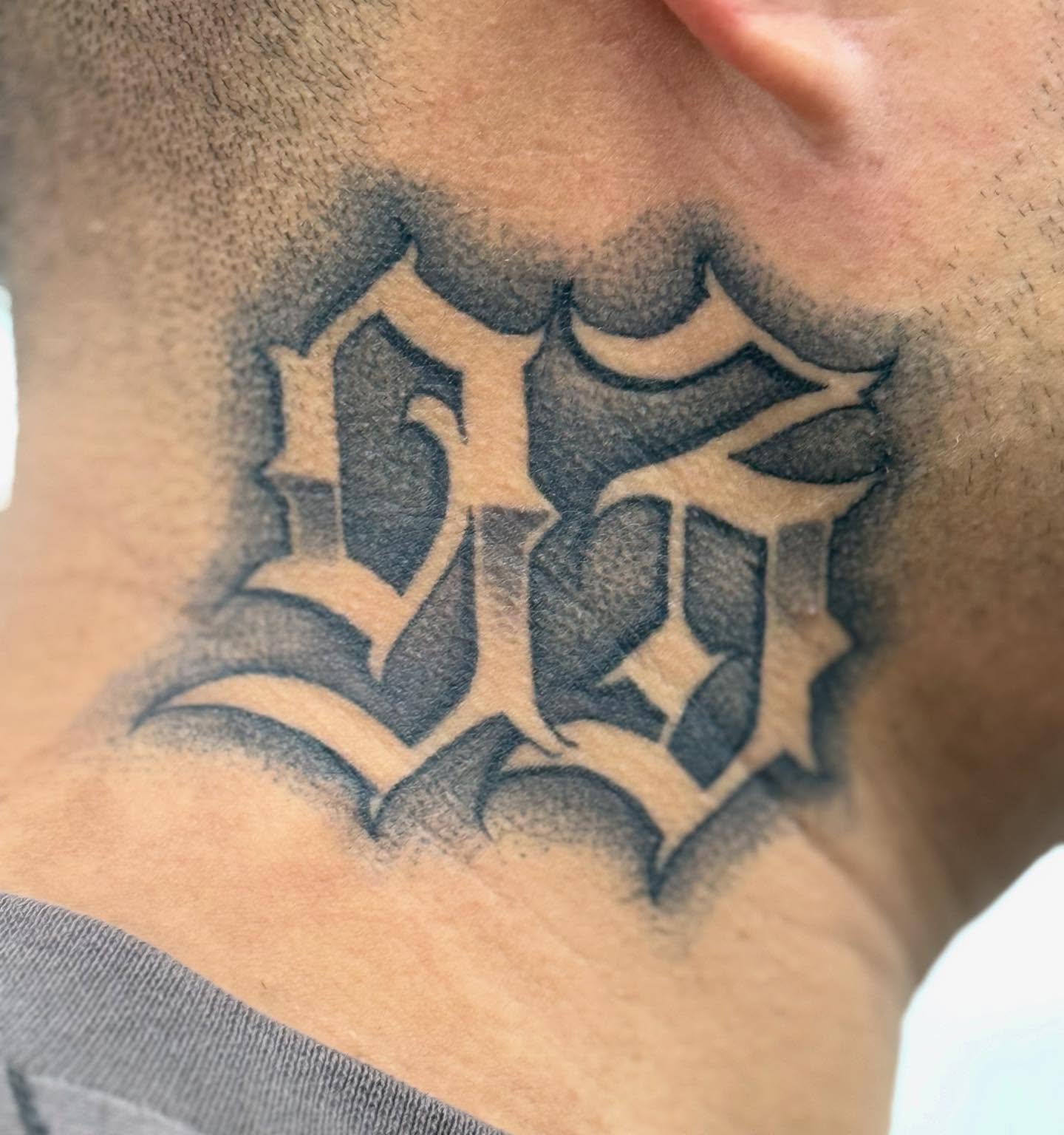 Lettering lettering script tattoo on the neck by @nickysix86
