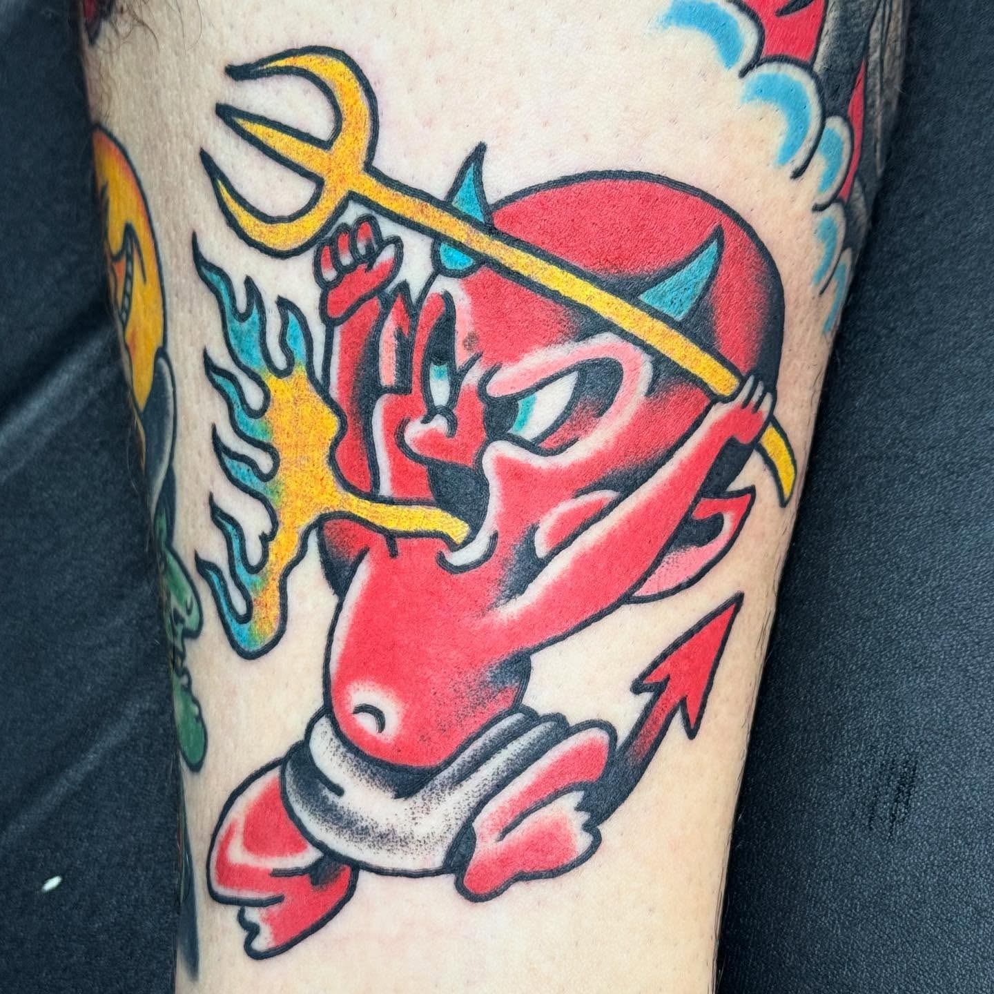 Red devil American traditional tattoo on the forearm by Sam Hambrick, Watchung NJ