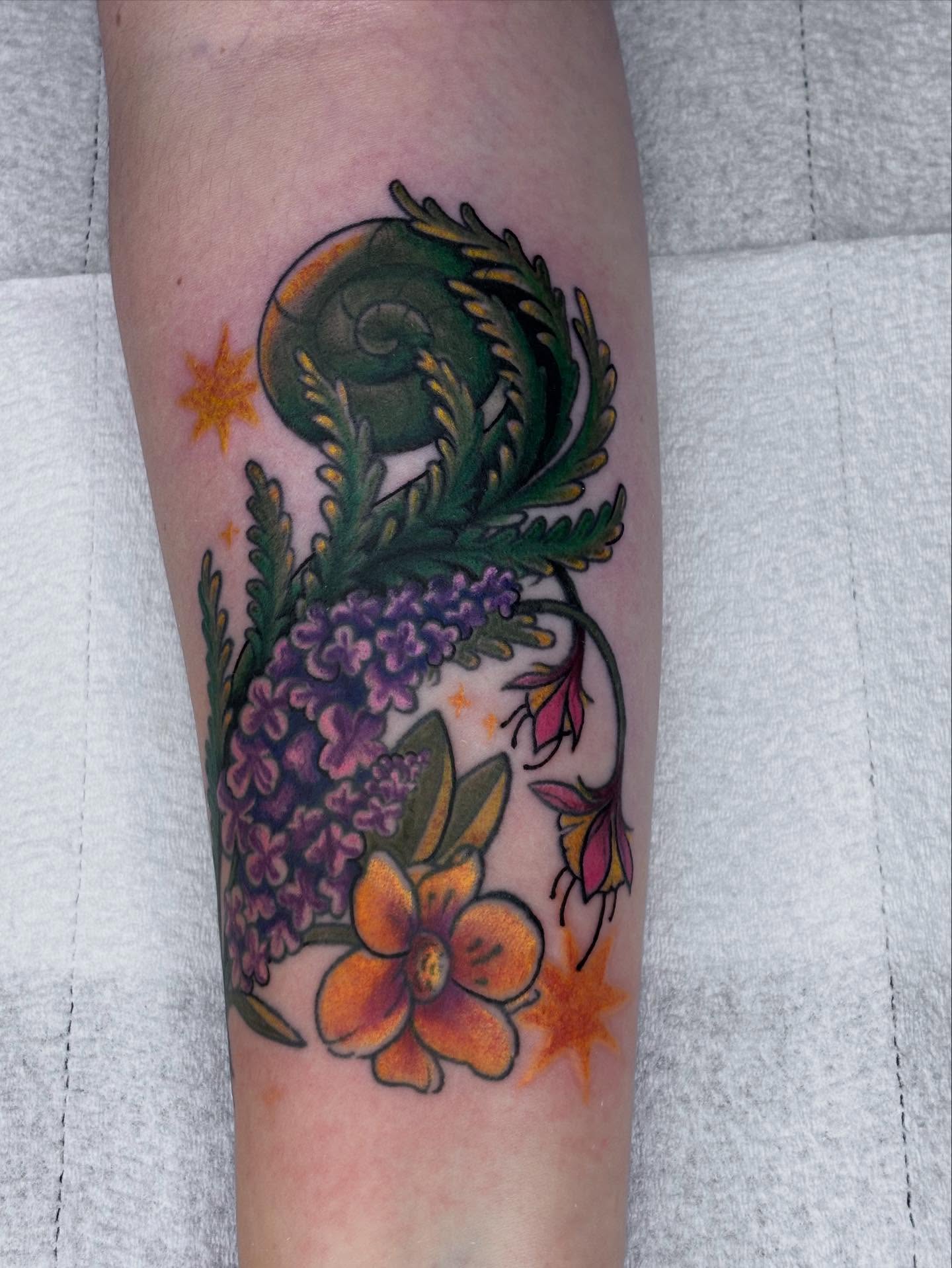 Floral and fern design new school tattoo on the forearm by π»πΈπ½π½, Ypsilanti, Michigan