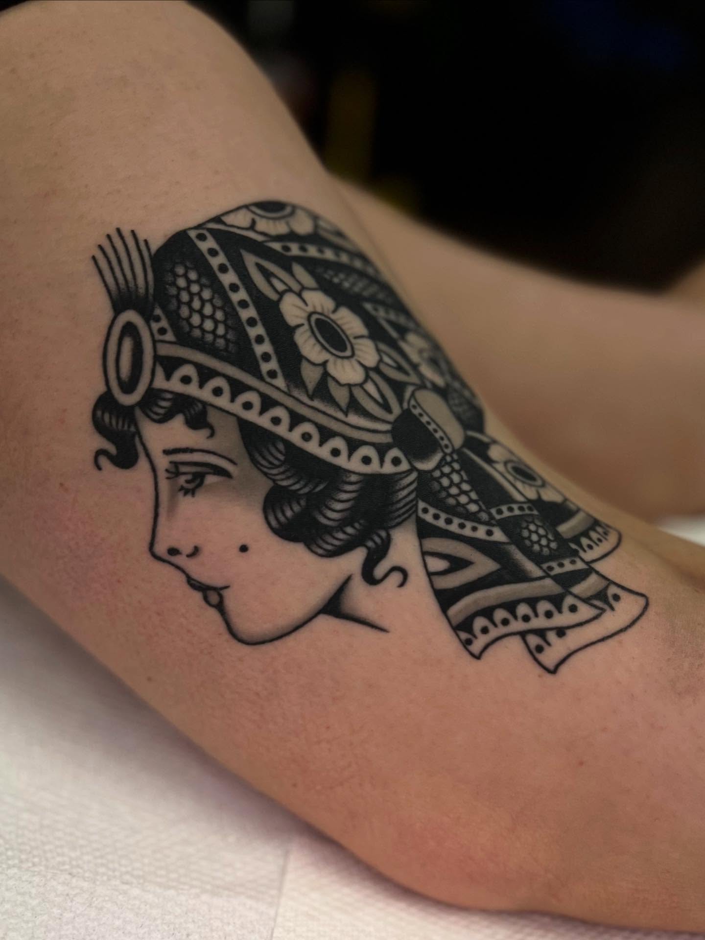 Profile of a woman black and grey tattoo on the forearm by Syd Sayyah