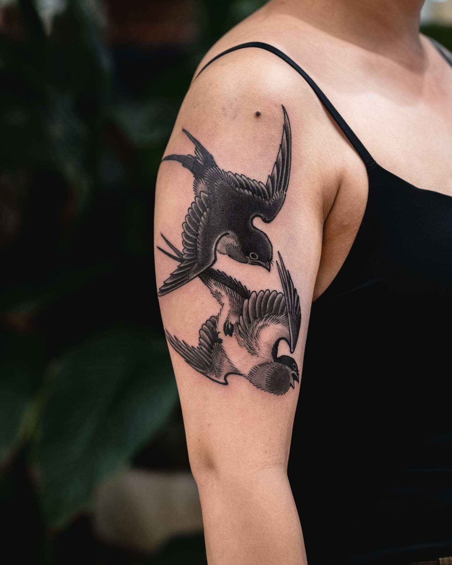 Birds black and grey tattoo on the upper arm by Matt Leibo, San Francisco, California