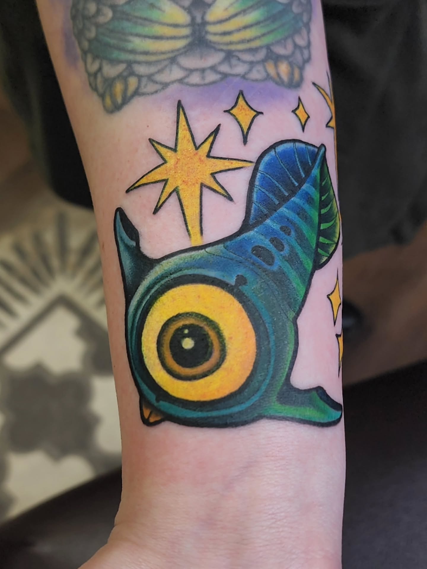 Fish American traditional tattoo on the forearm by Shawna Goettsche