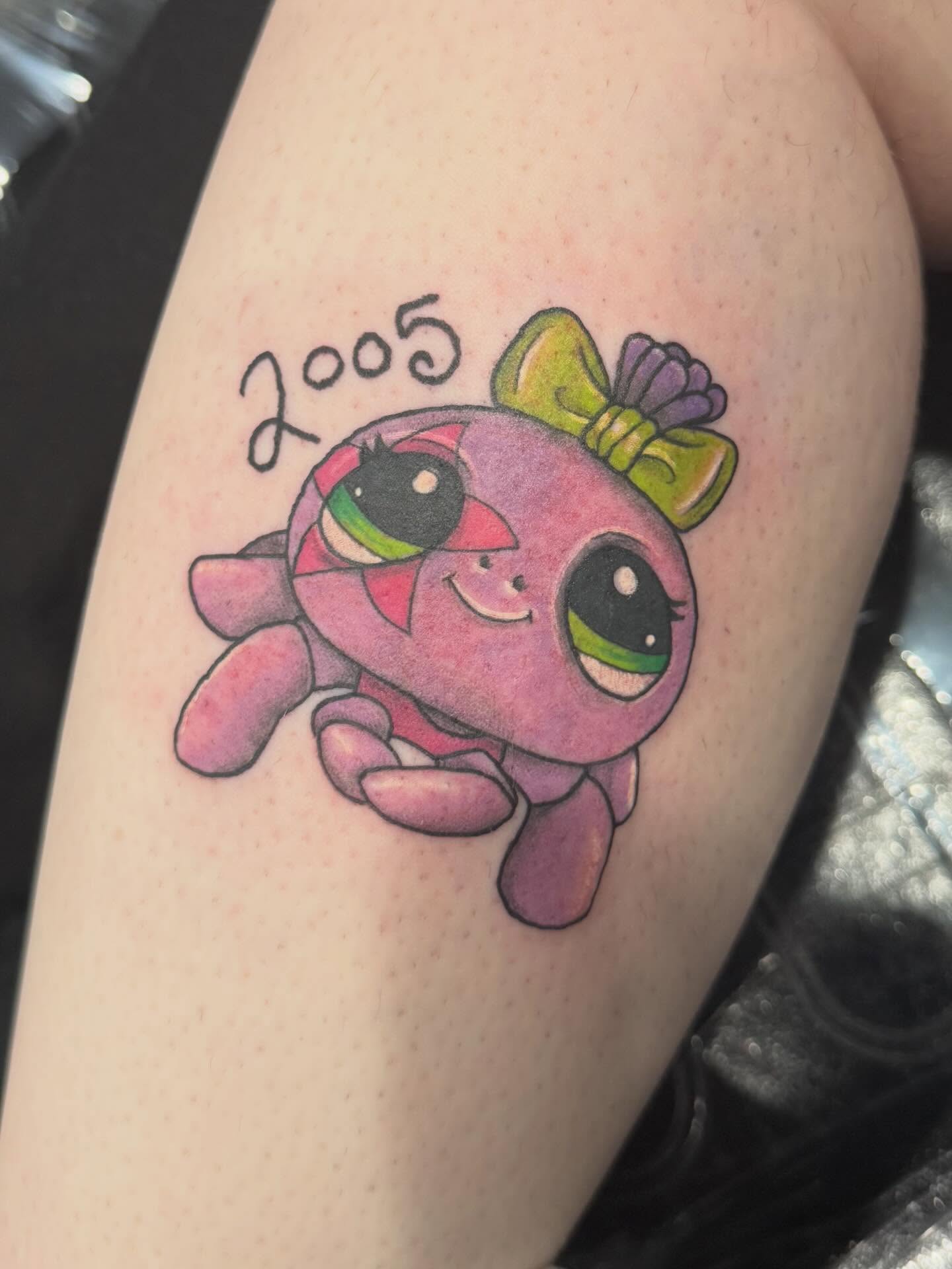 Turtle new school tattoo on the thigh by Courtney