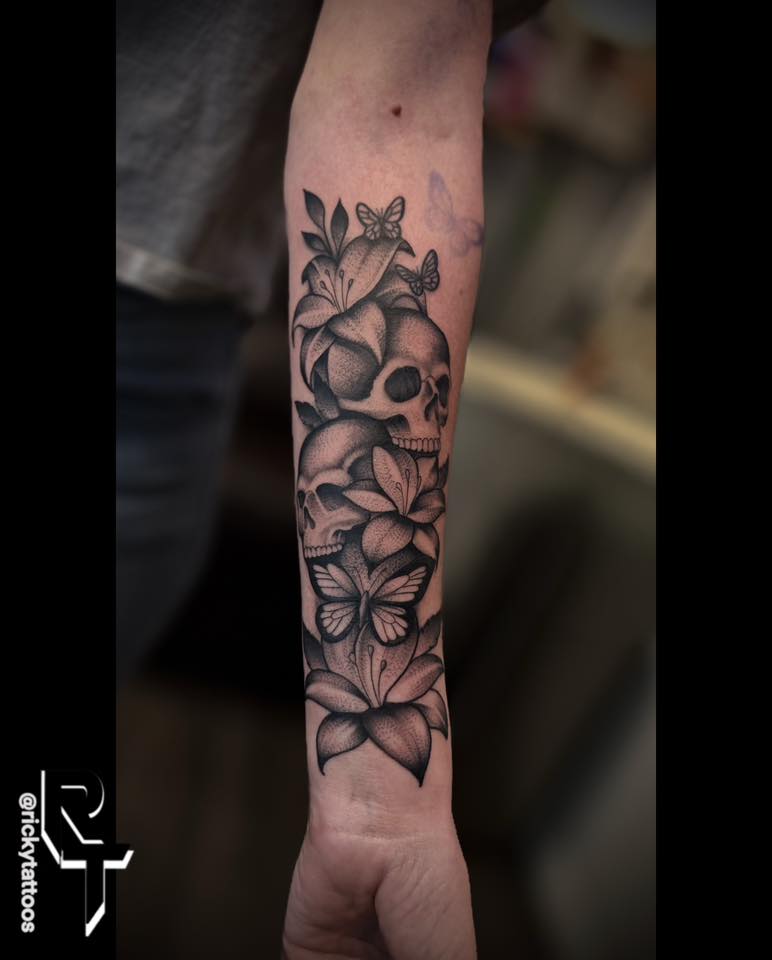 Skull and flowers dotwork tattoo on the forearm by Ricky Salinas Jr. π€, San Antonio, Texas