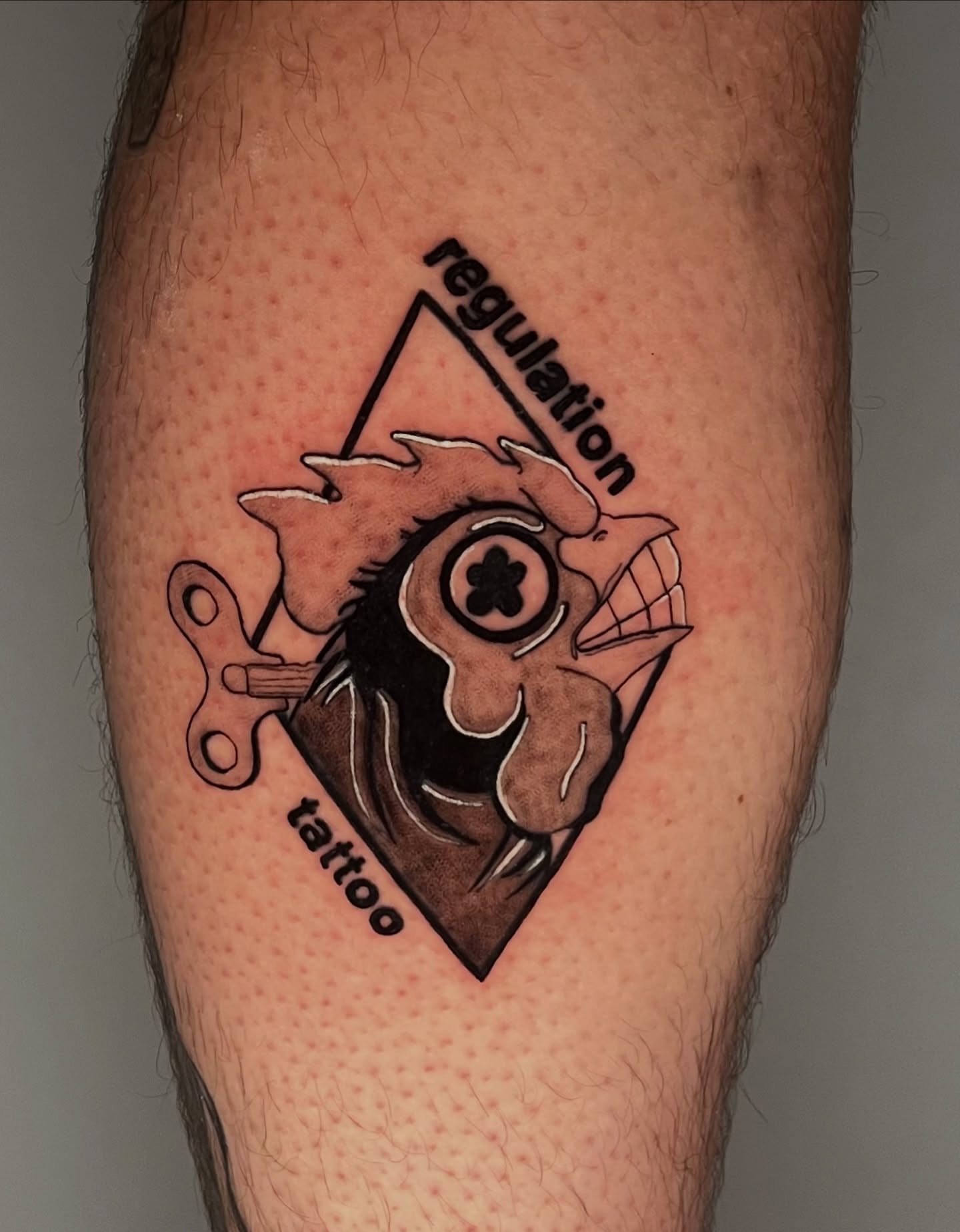 Owl geometric tattoo on the forearm by Jerm Lewis