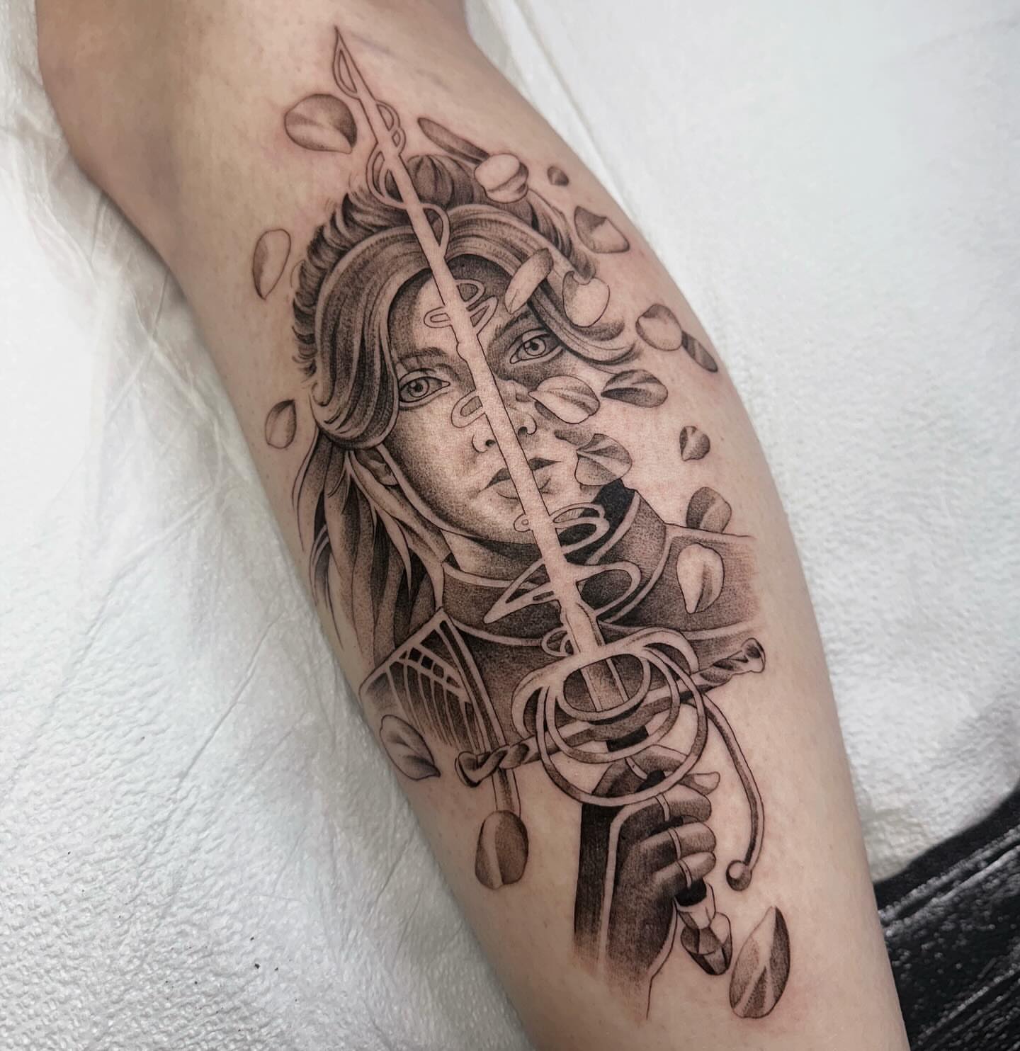 Woman with flute realism tattoo on the forearm by Alyssa . Villela