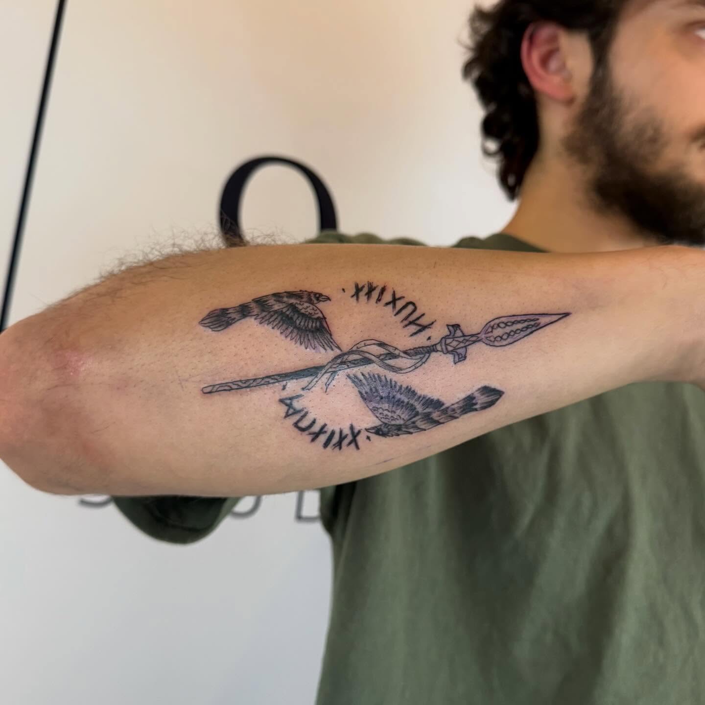 Birds and spear black and grey tattoo on the forearm by Paul Calhoun Tattoos, Englewood, Ohio