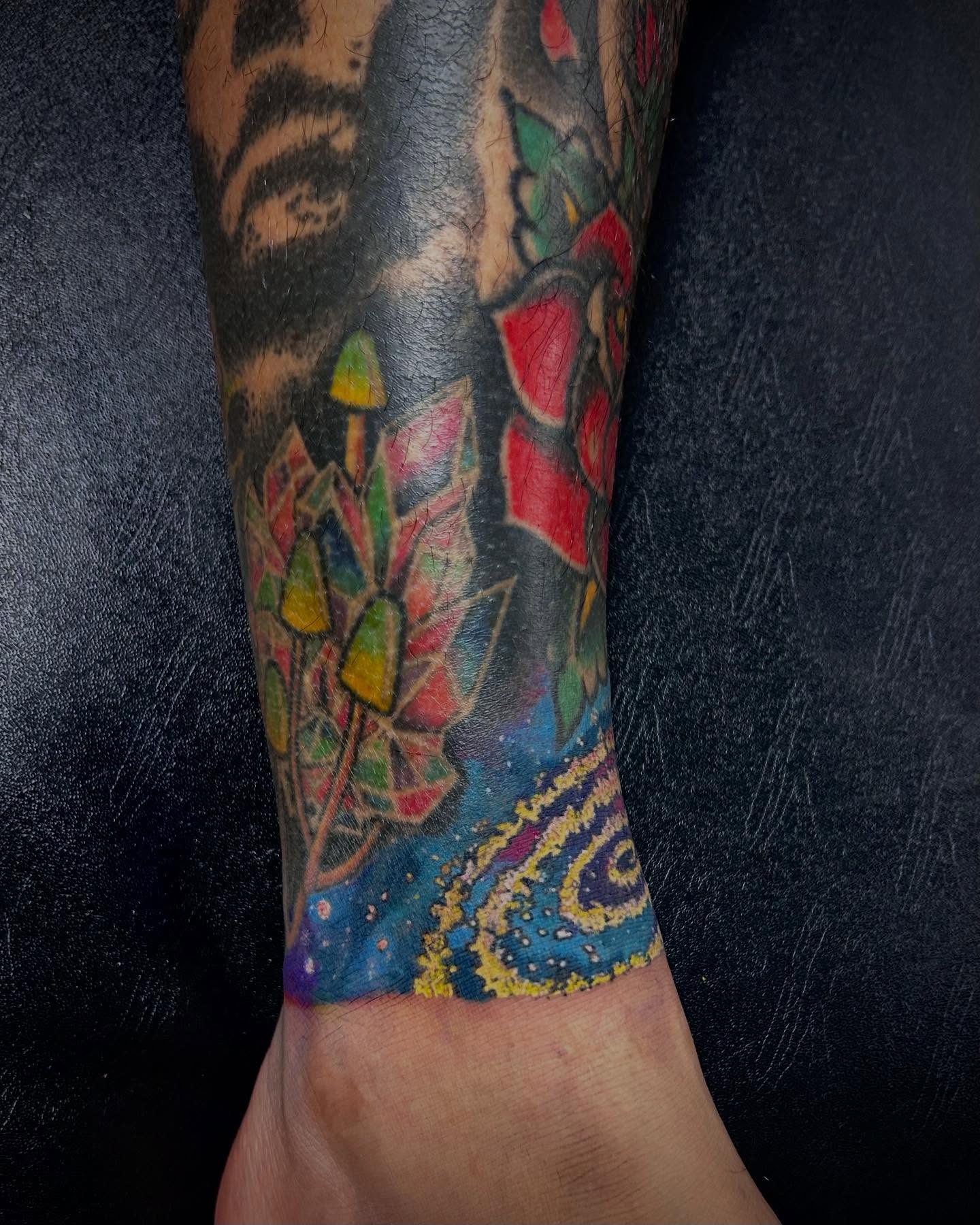 Geometric fireworks geometric tattoo on the forearm by Jon Byrd