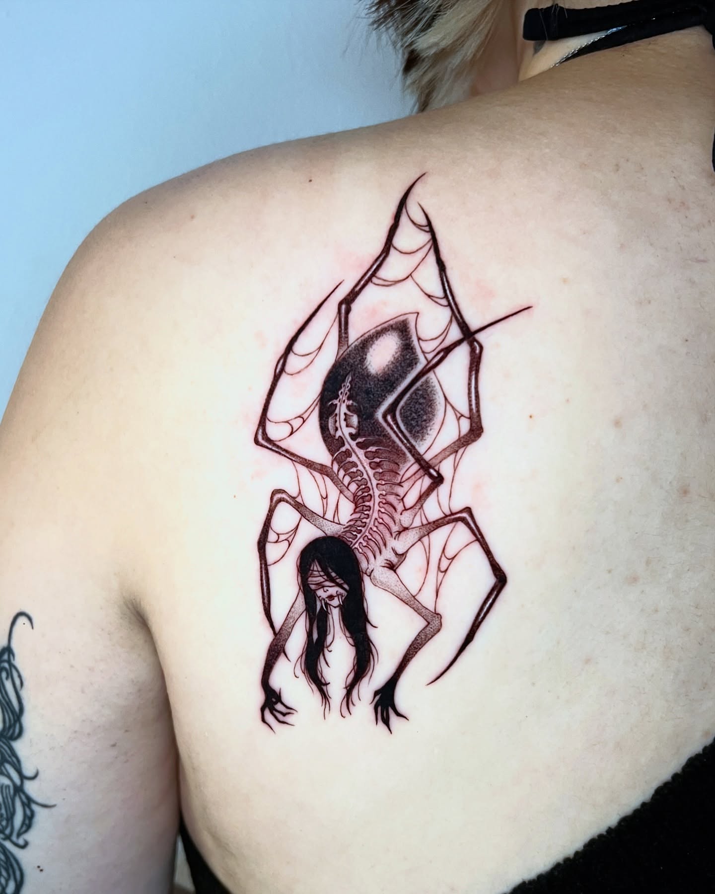 Spider and woman dark realism tattoo on the back by AJ π°π· LA tattoo