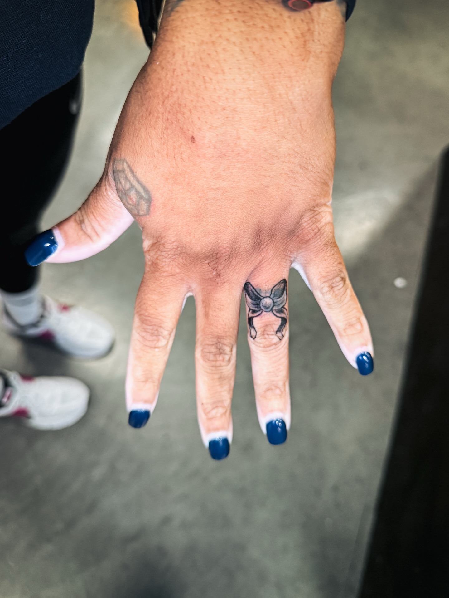 Butterfly dotwork tattoo on the hand by Brandt Norcross
