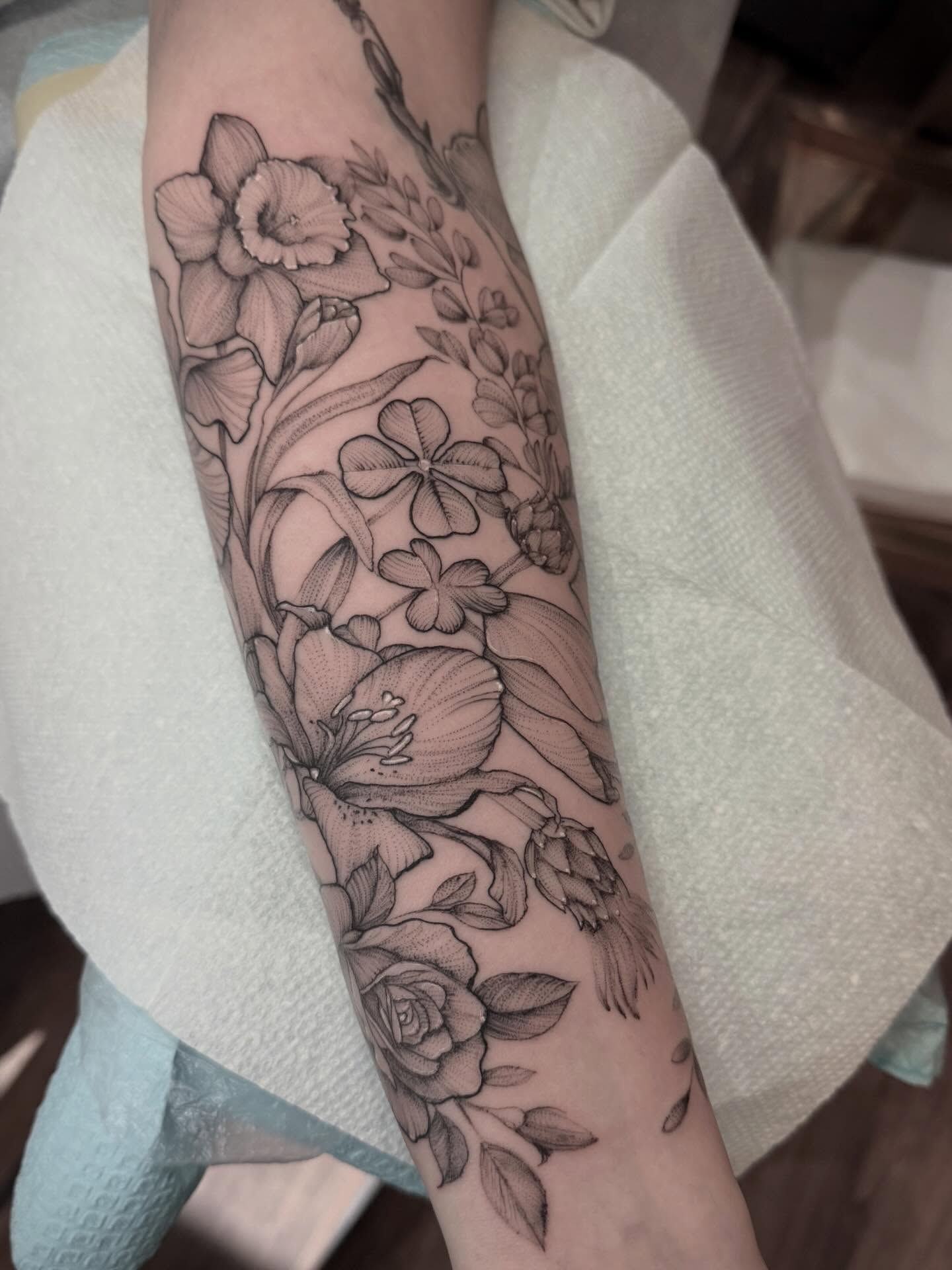 Floral arrangement realism tattoo on the forearm by Tattoos by Robyn Pallotta, Austin, Texas