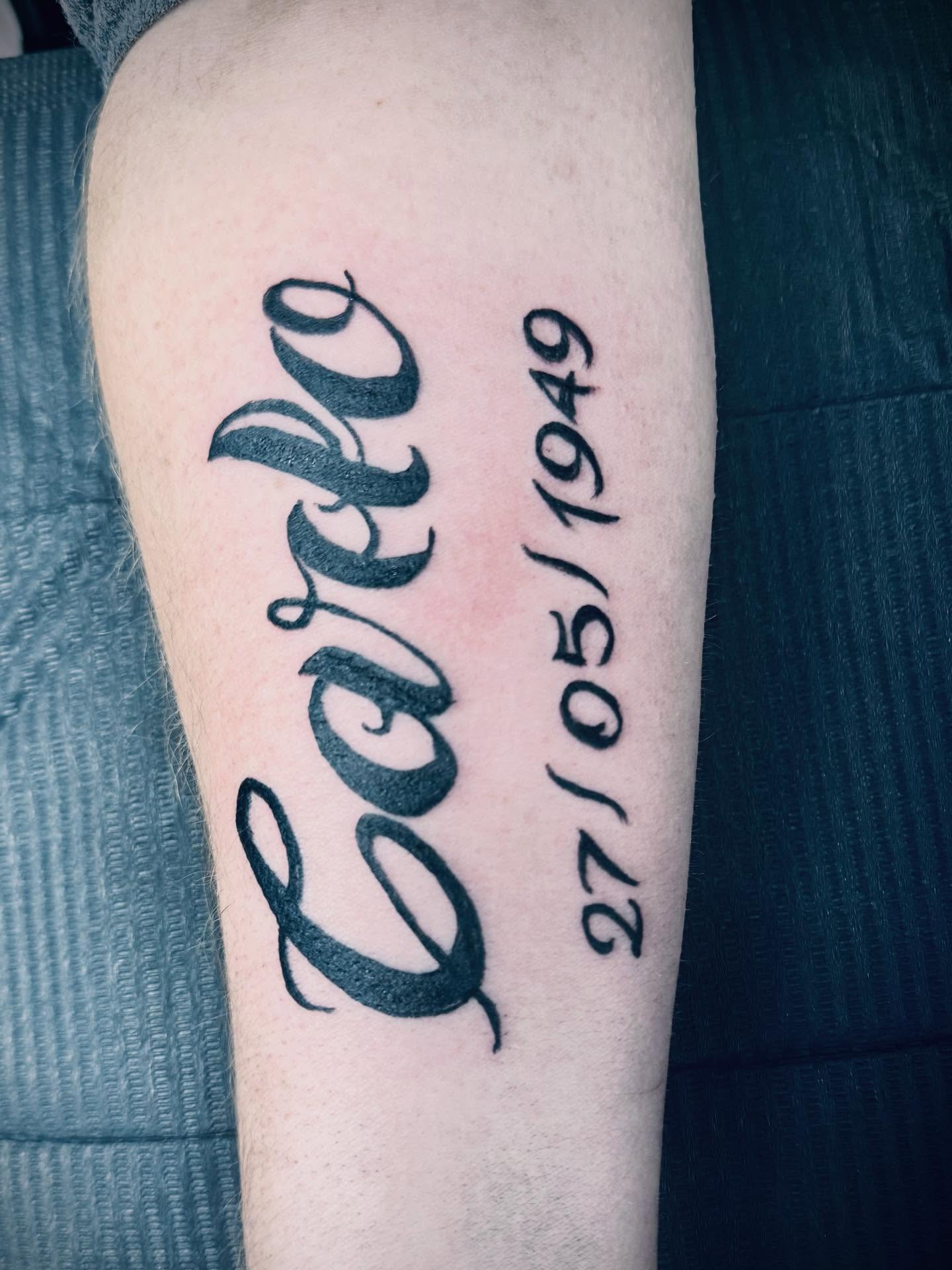Script lettering lettering script tattoo on the forearm by Salvador Mendoza, Sesto San Giovanni