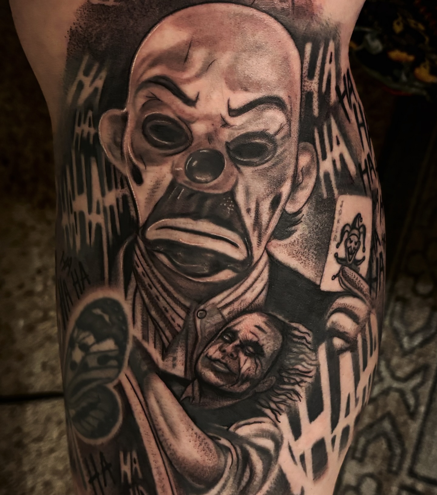 Joker character realism tattoo on the forearm by Alexandria Gudiel