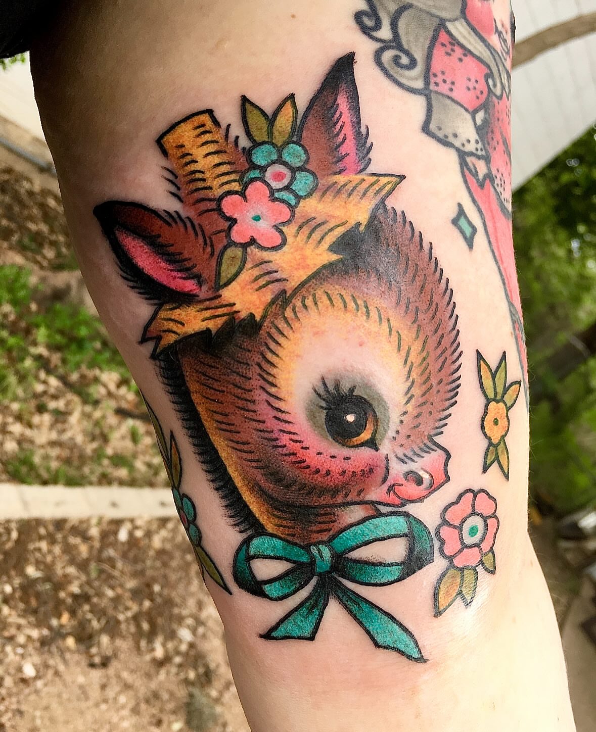 Deer with flowers American traditional tattoo on the forearm by Stacey Martin Smith