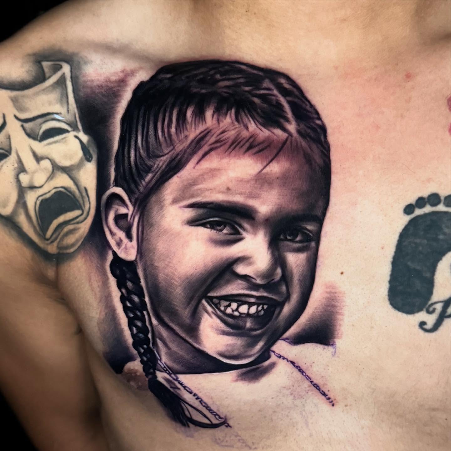 Portrait of a child realism tattoo on the chest by Drink Ink Tattoos™ 👽