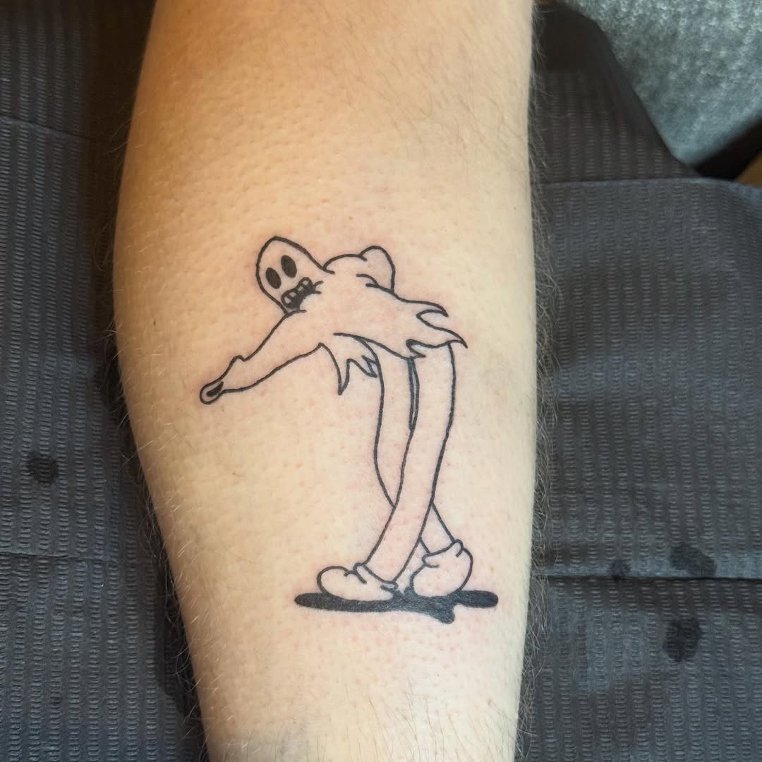 Cartoon ghost ignorant tattoo on the forearm by Danny Garcia