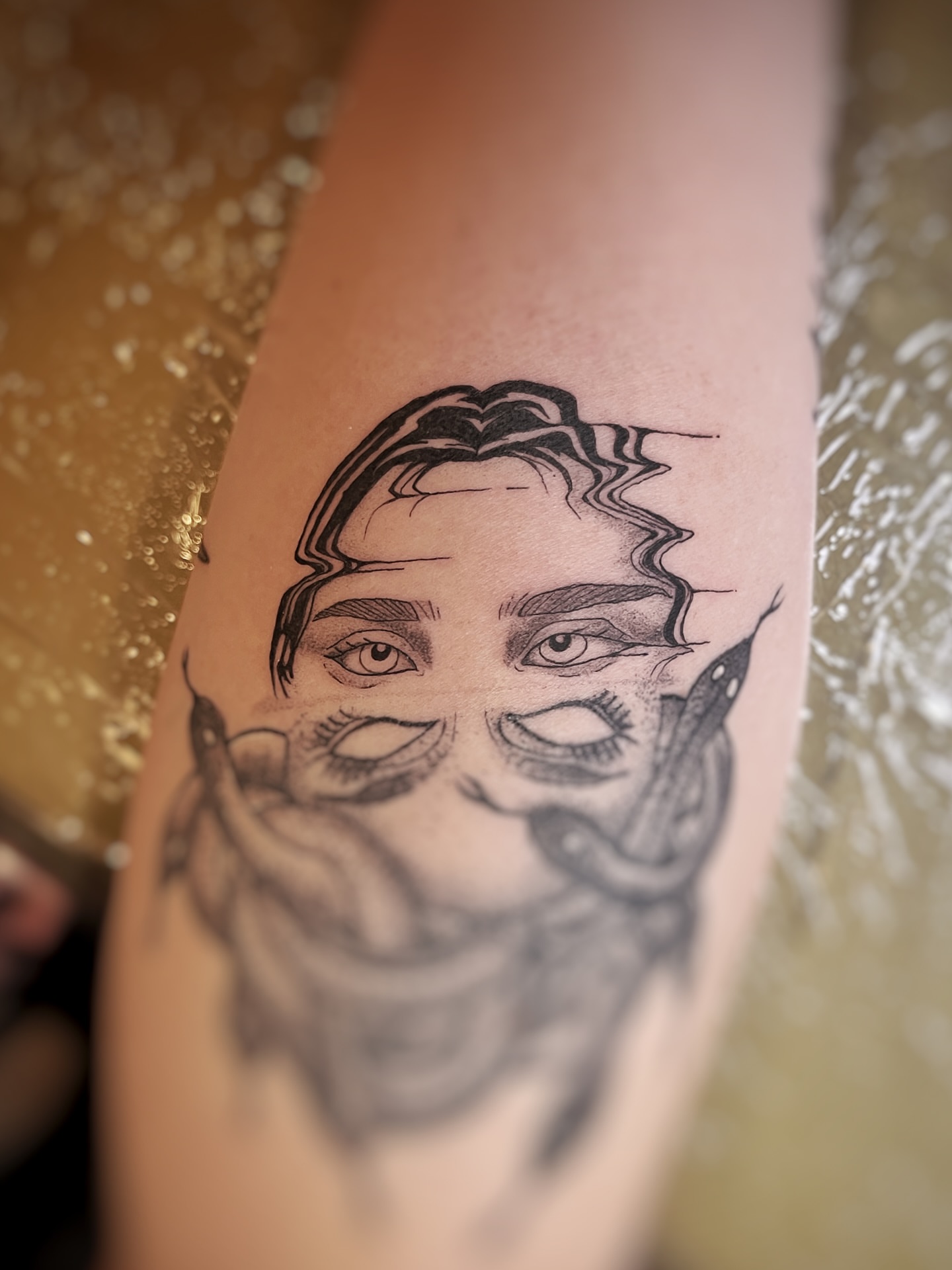 Portrait realism tattoo on the forearm by Risa Cincinnati Tattoo Artist