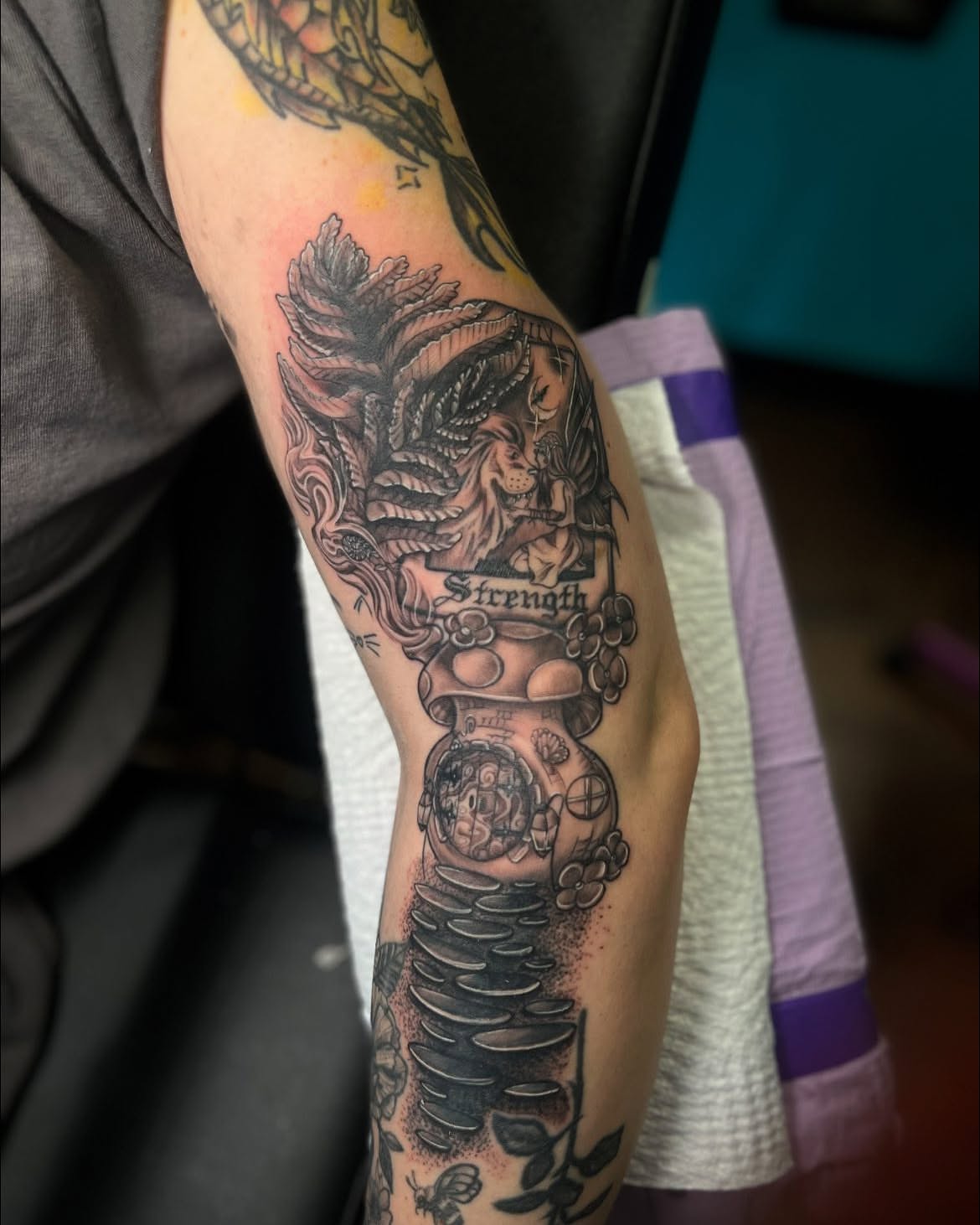Woman with wings American traditional tattoo on the forearm by Chelsea Nichole