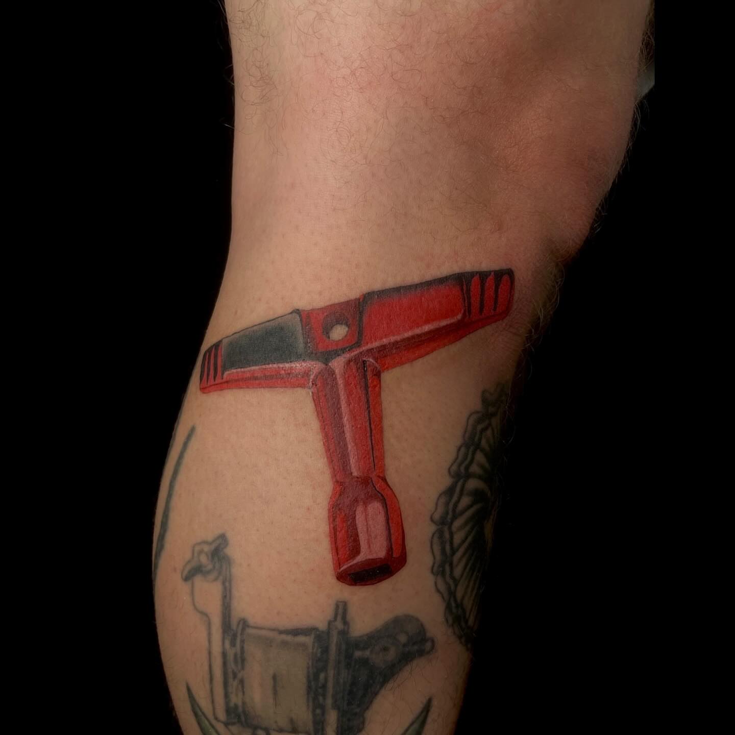 Gun realism tattoo on the forearm by Chase Healey, Salt Lake City, Utah