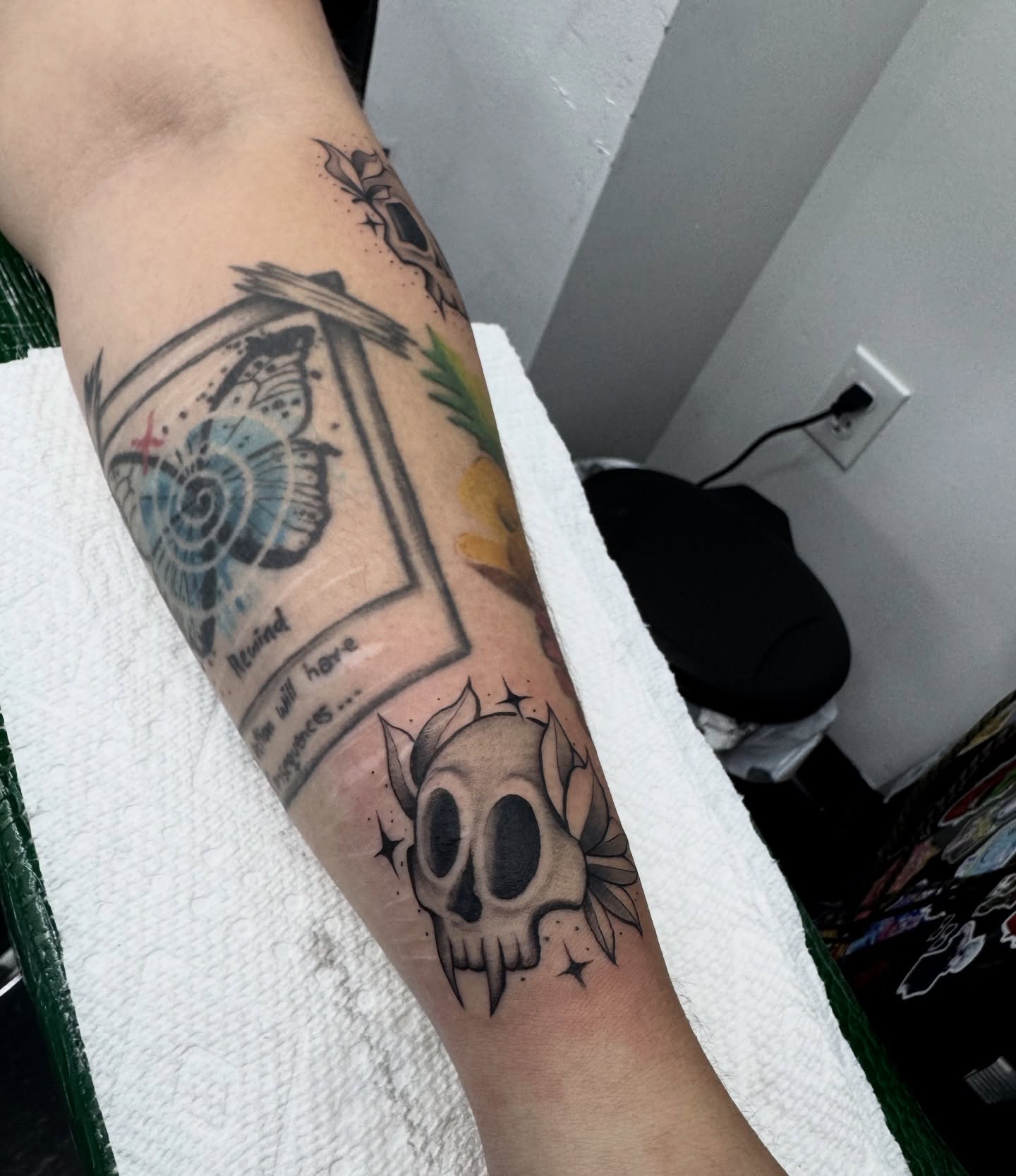Skull and butterfly neo-traditional tattoo on the forearm by πππππ¨π¨ ππ«ππ’π¬π