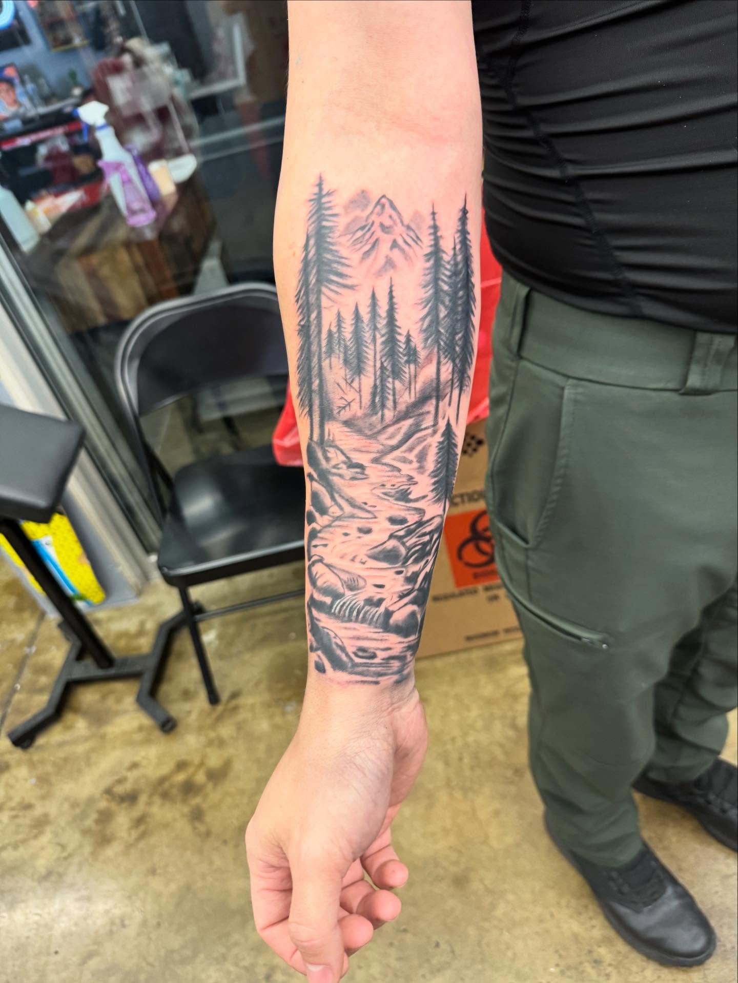 Forest landscape realism tattoo on the forearm by Willi Tattoos👹
