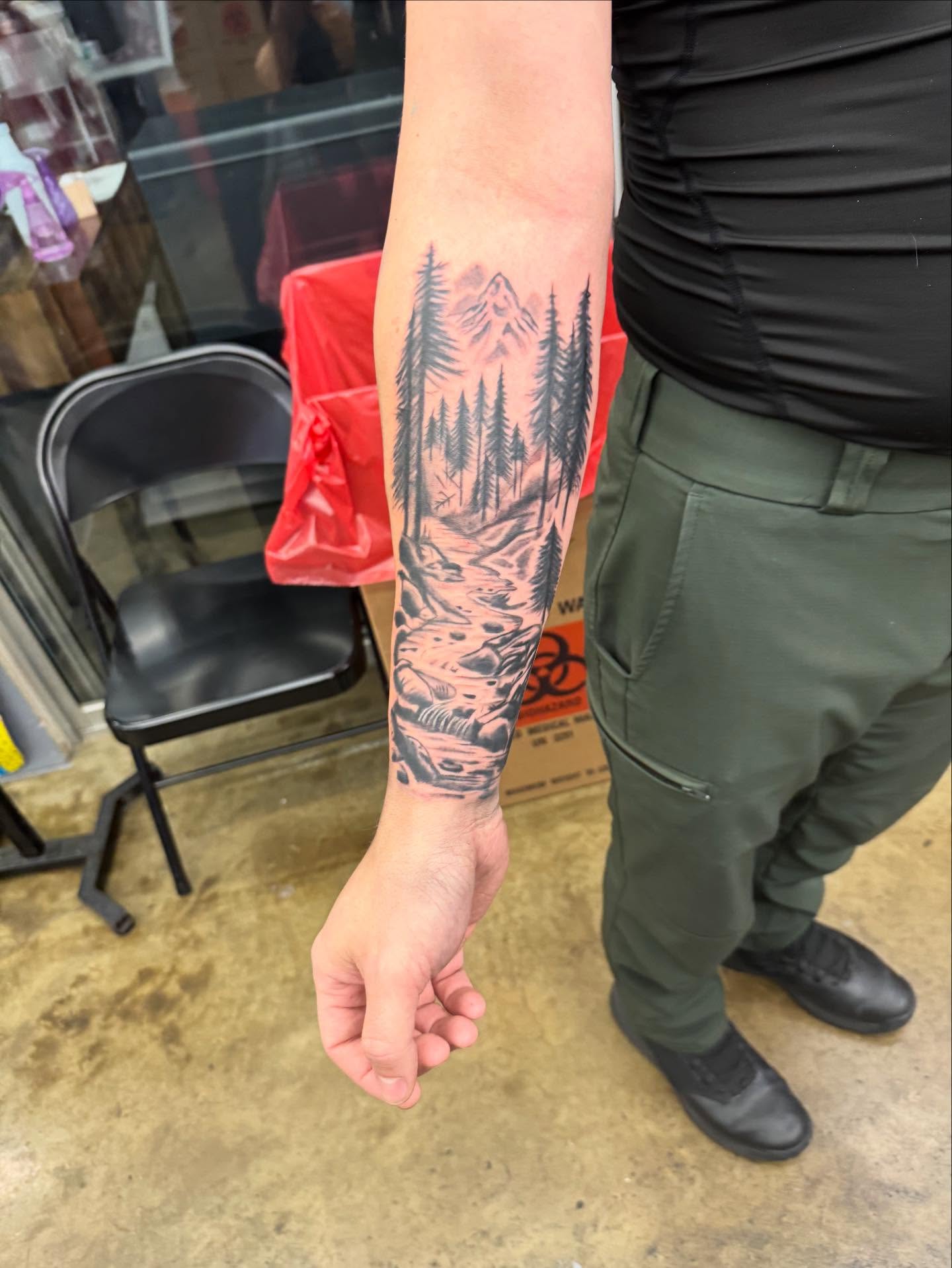 Forest landscape realism tattoo on the forearm by Willi Tattoos👹