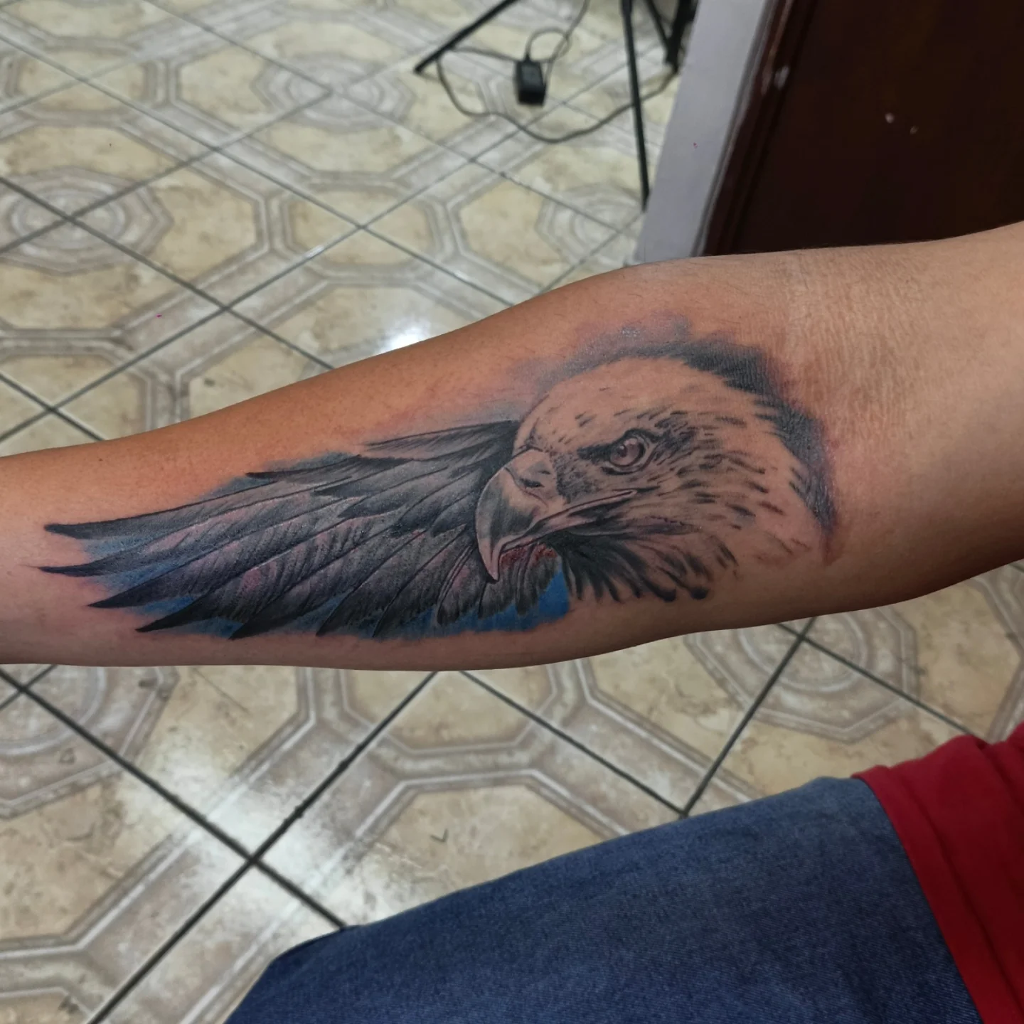 Eagle realism tattoo on the forearm by Alexander Tattooink