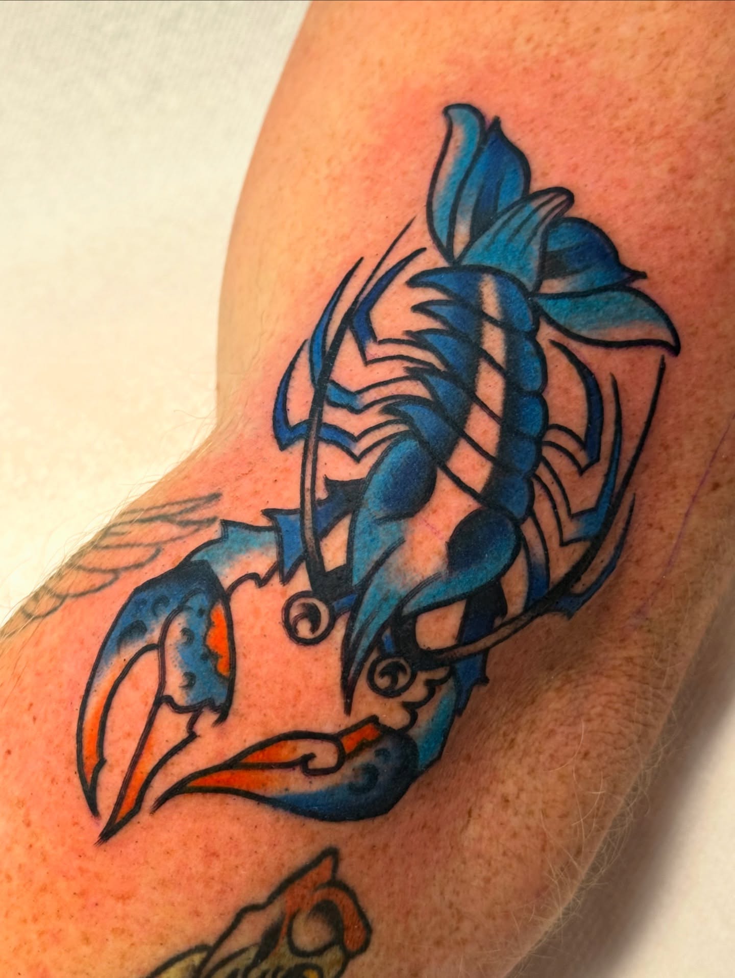 Lobster American traditional tattoo on the forearm by sydtatz