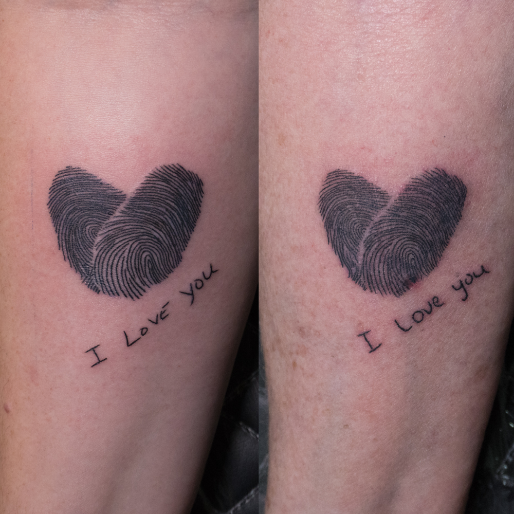 Fingerprint heart black and grey tattoo on the forearm by Donald Voelker