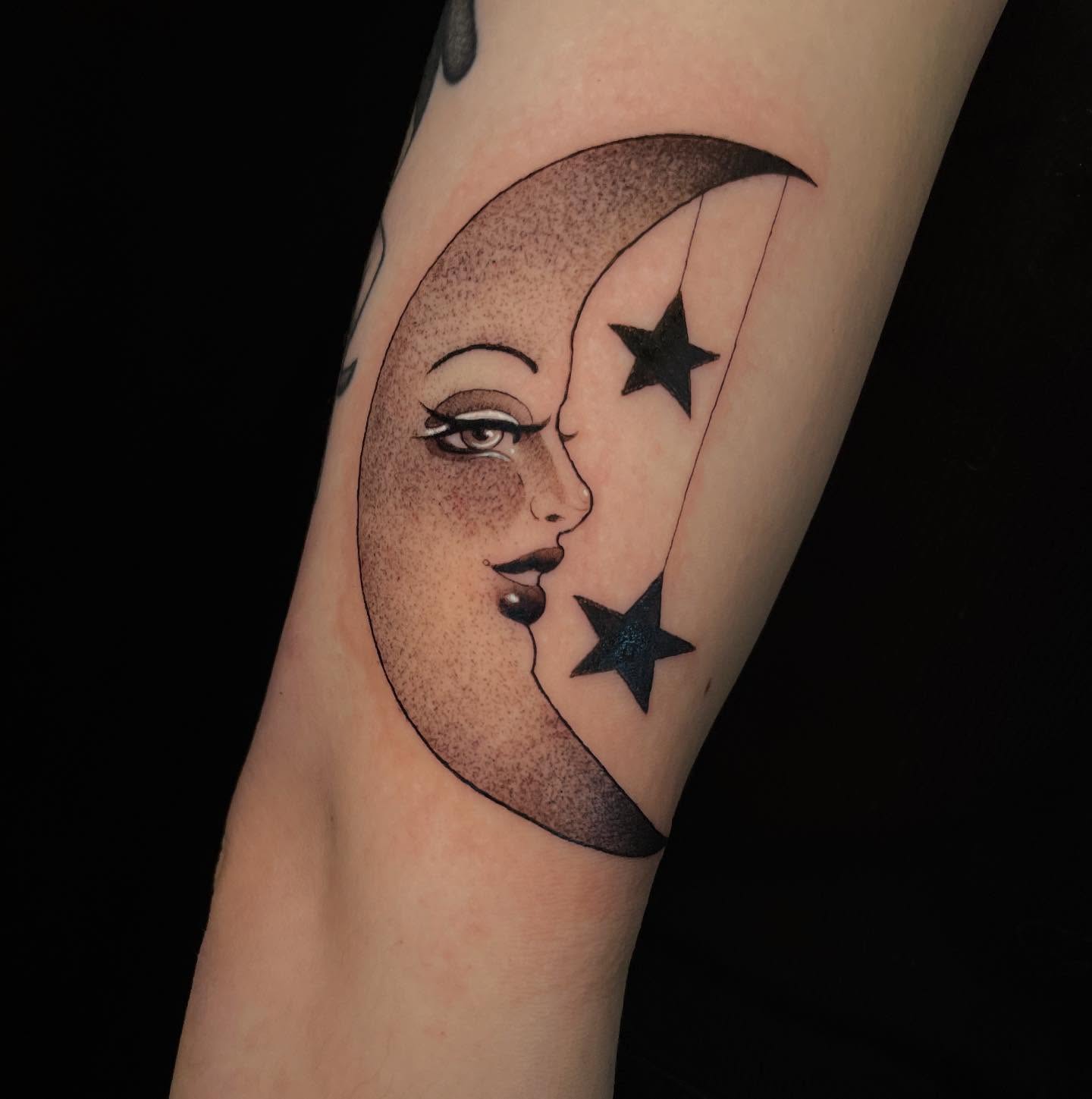 Moon and star dotwork tattoo on the forearm by Reagan Mauldin