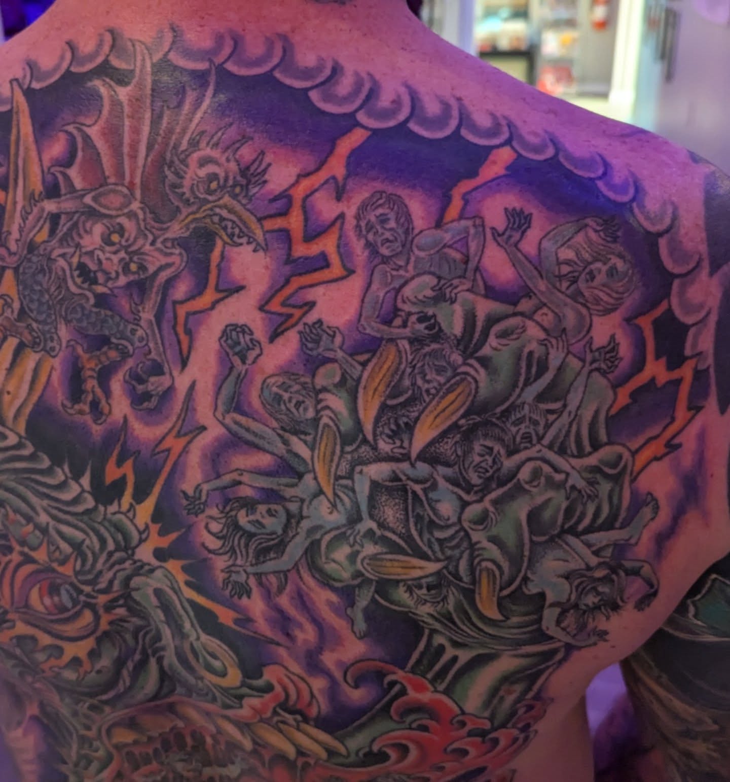 Battle scene American traditional tattoo on the back by Ryan Slegel